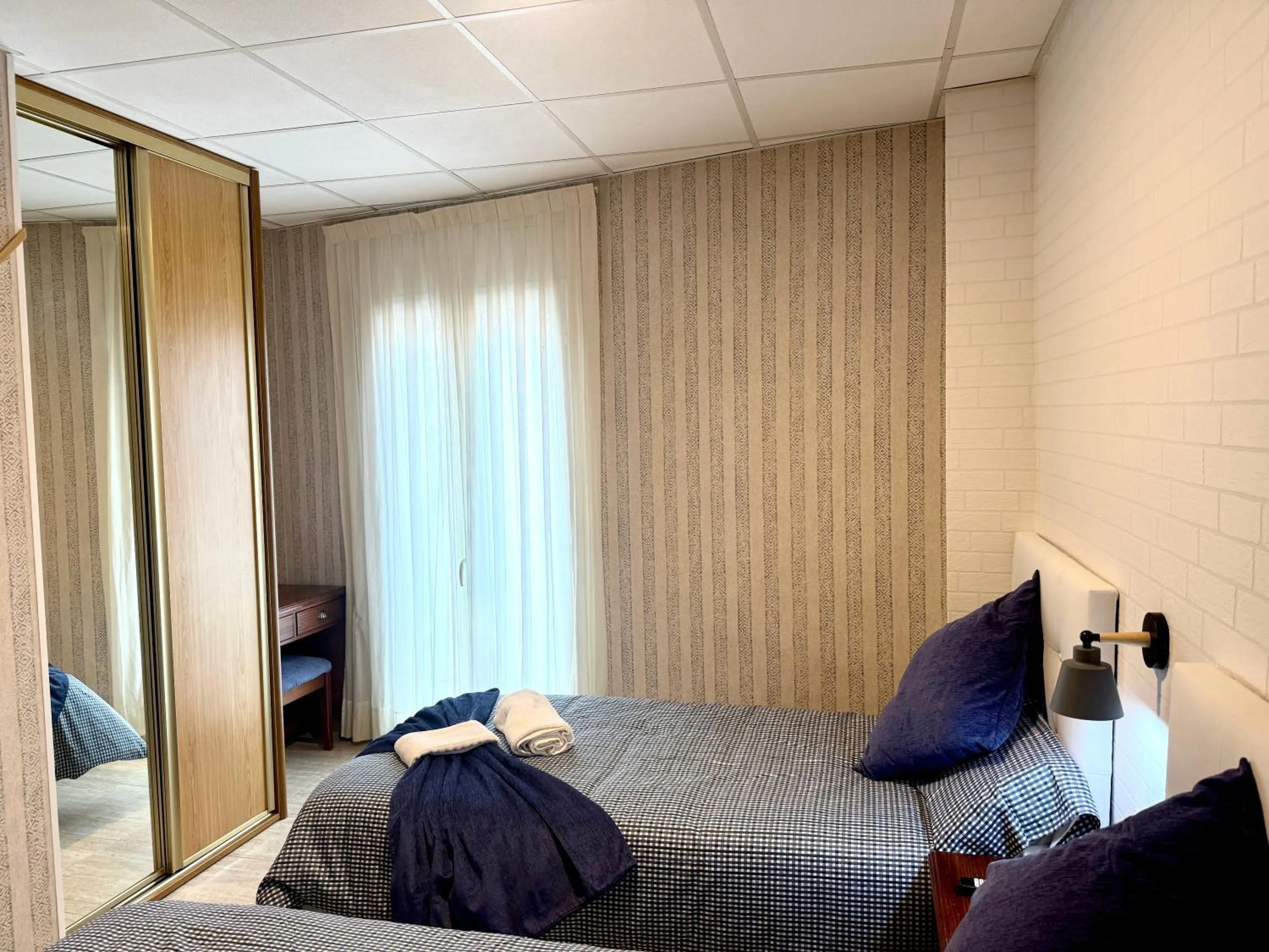 Bed in Hotel Sancho