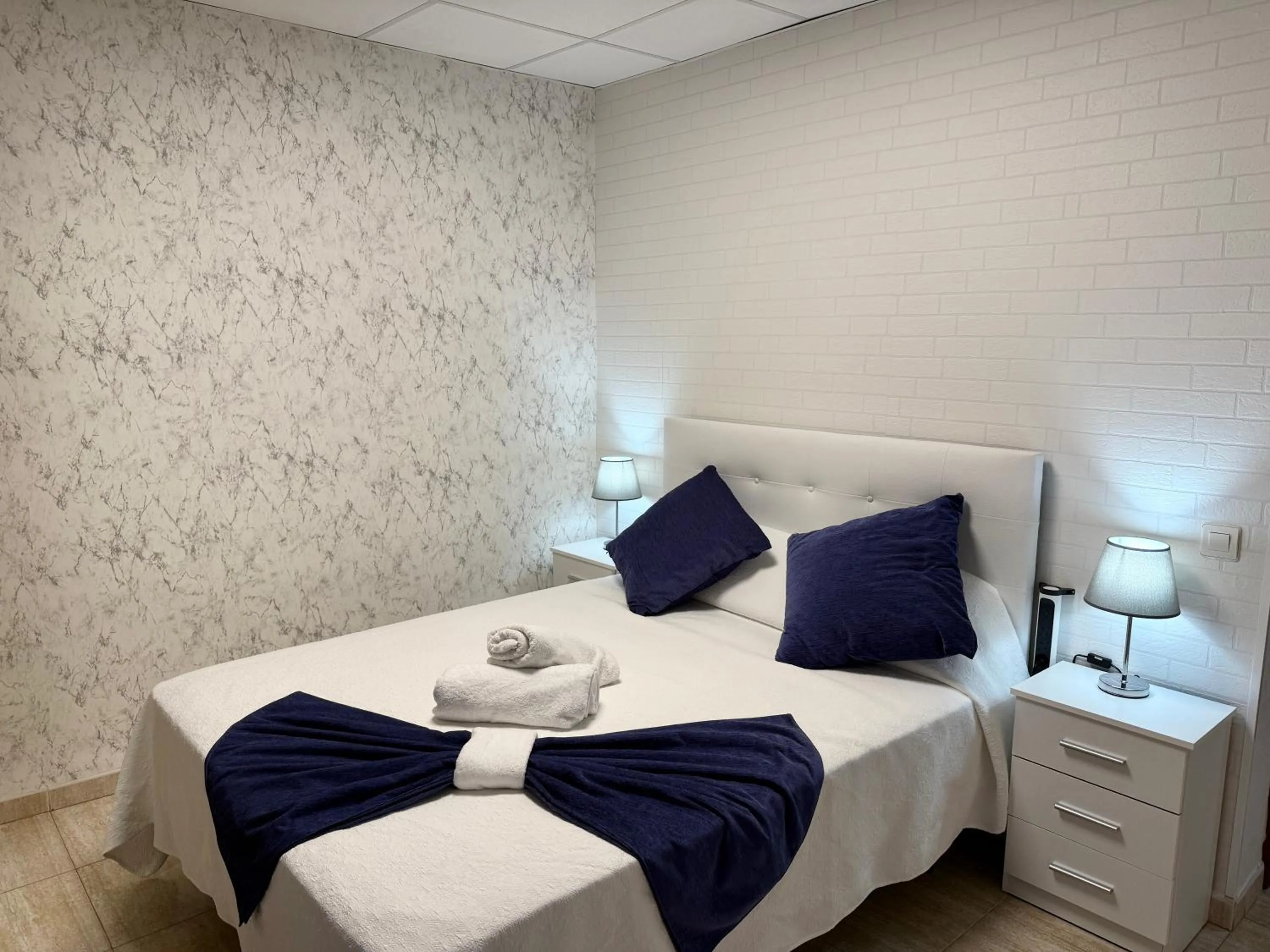 Bed in Hotel Sancho