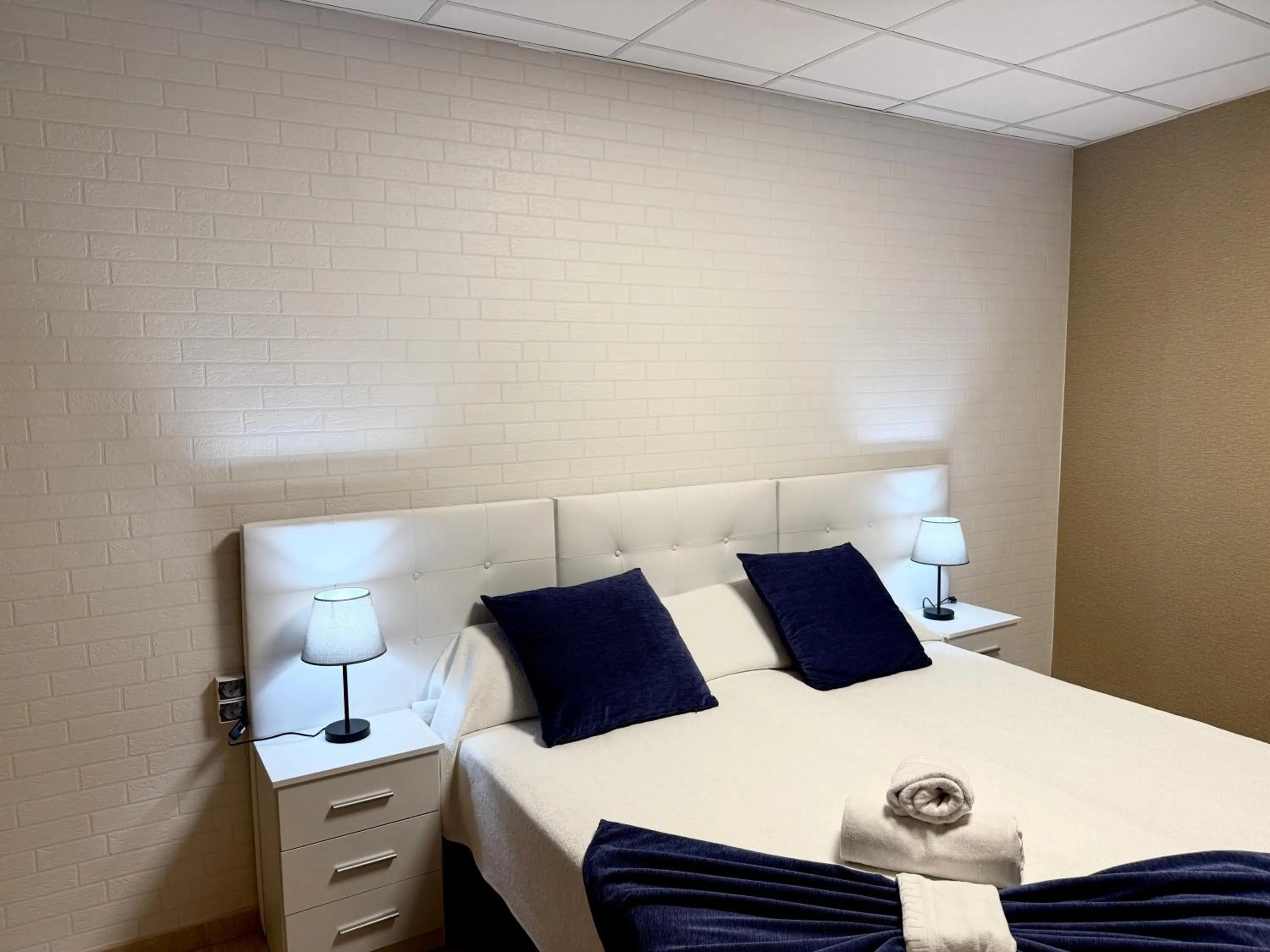 Bed in Hotel Sancho