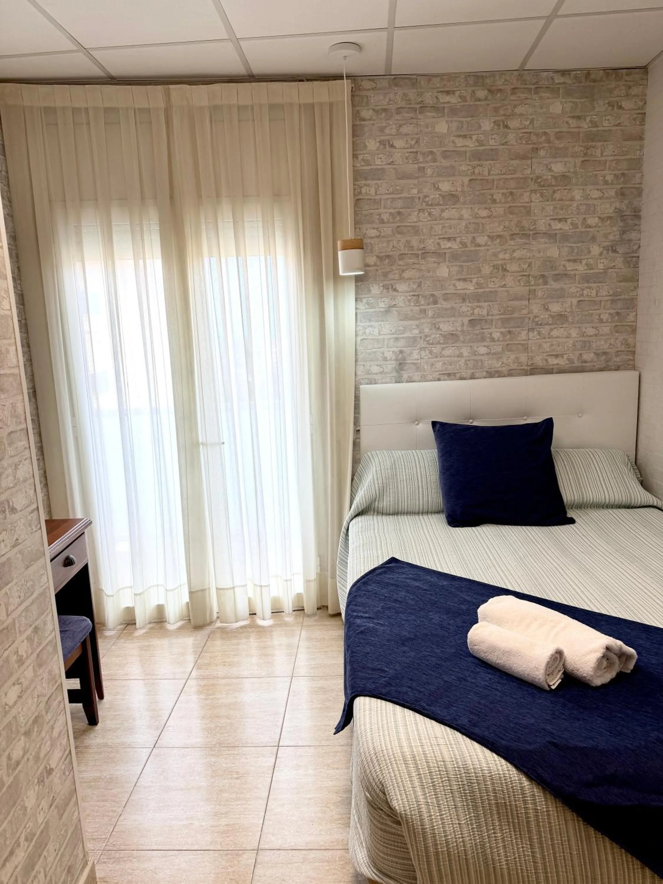 Bed in Hotel Sancho