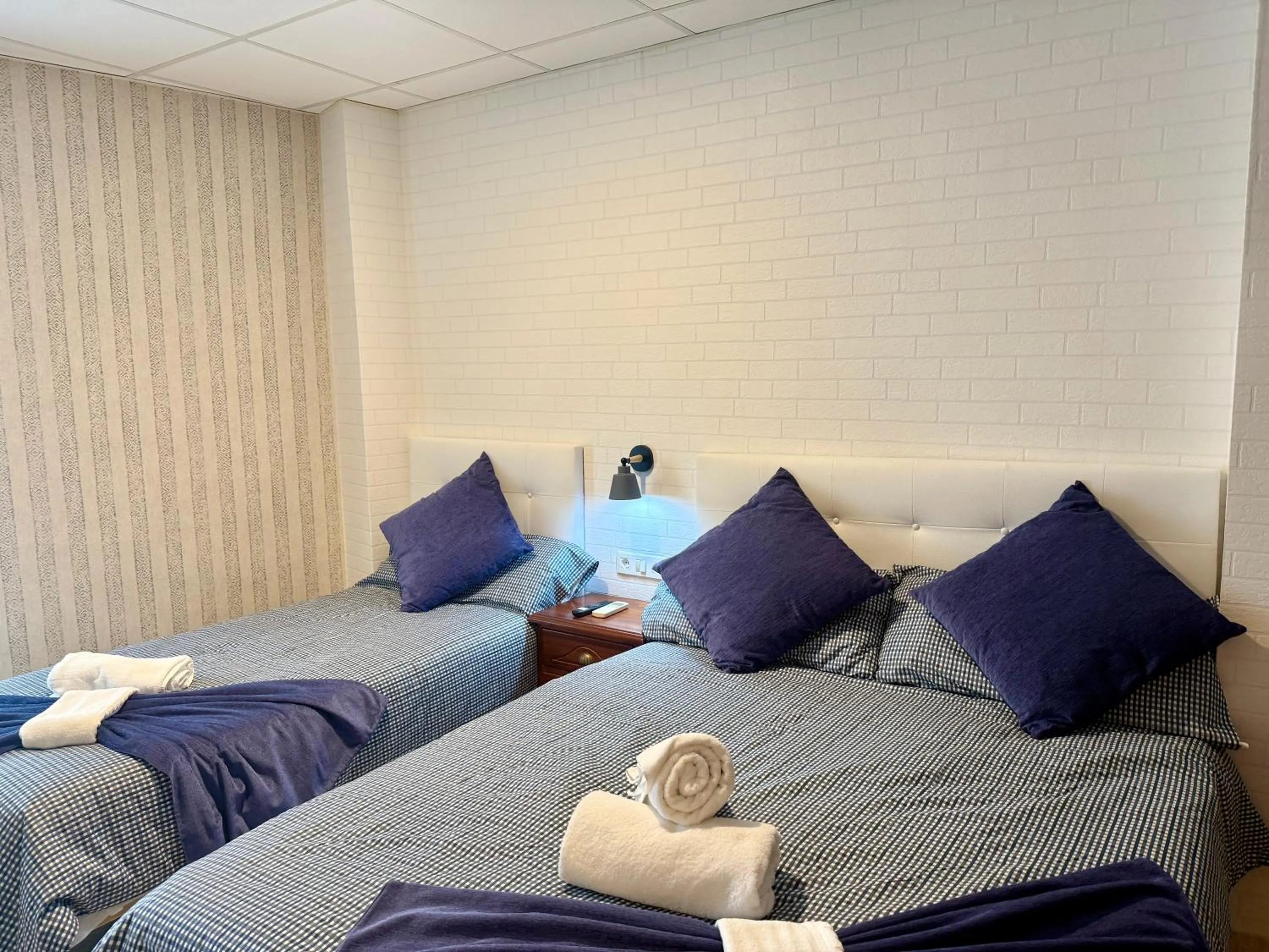 Bed in Hotel Sancho