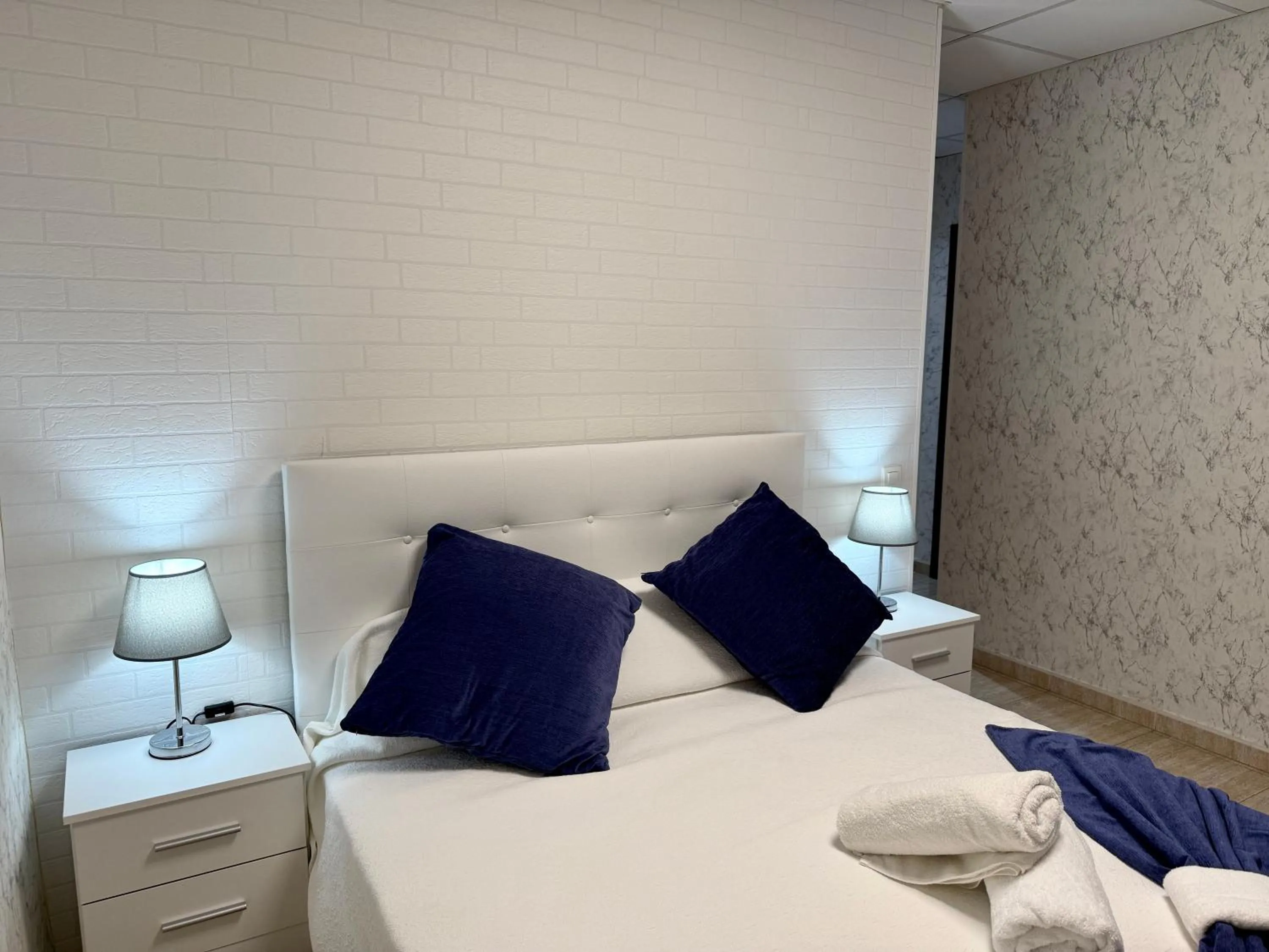 Bed in Hotel Sancho