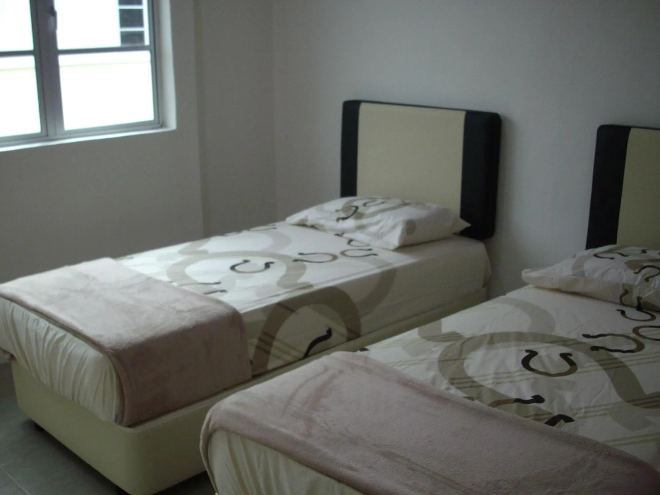 Bed in Greenleaf Angsana Homestay