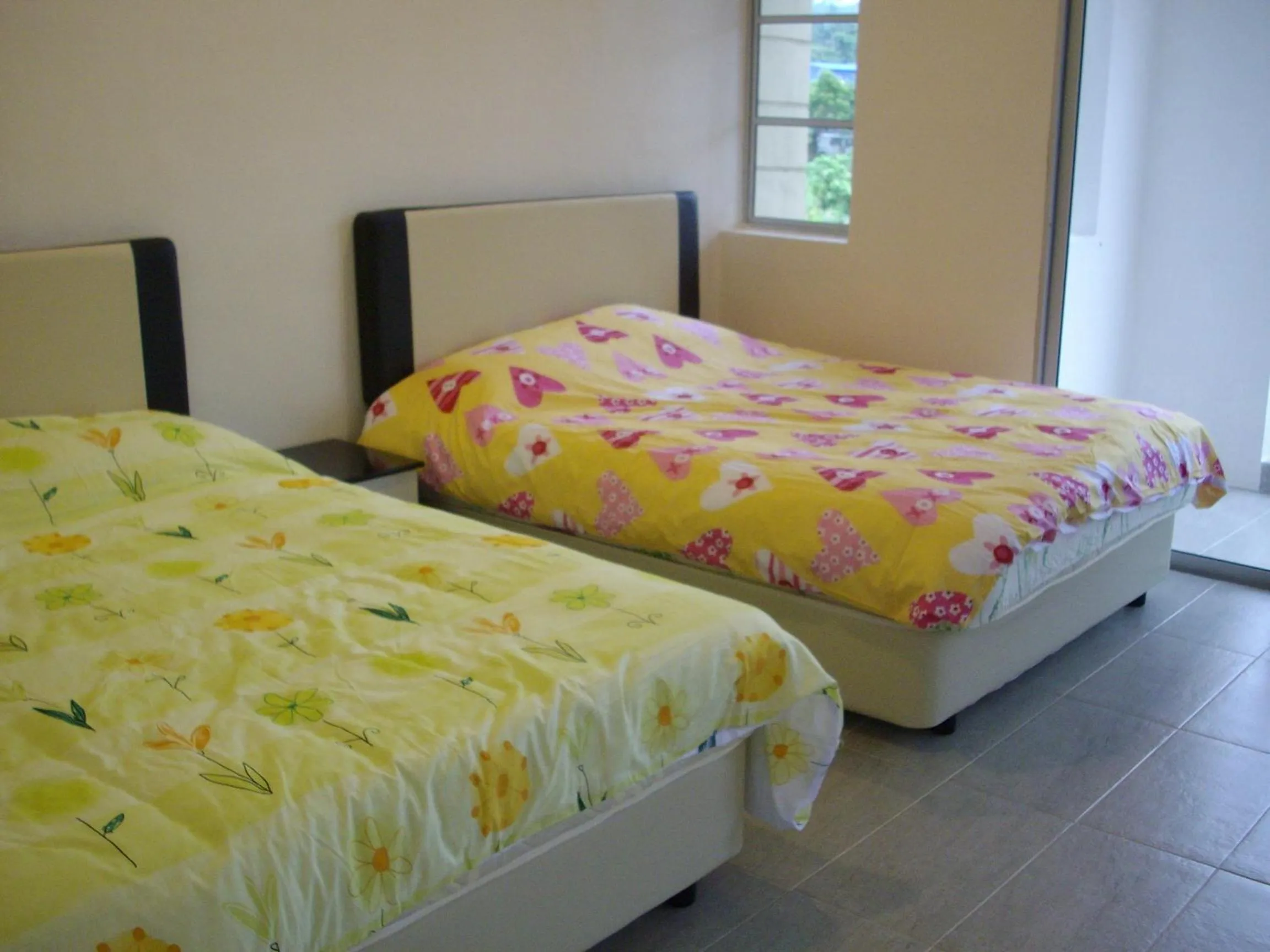 Bed in Greenleaf Angsana Homestay