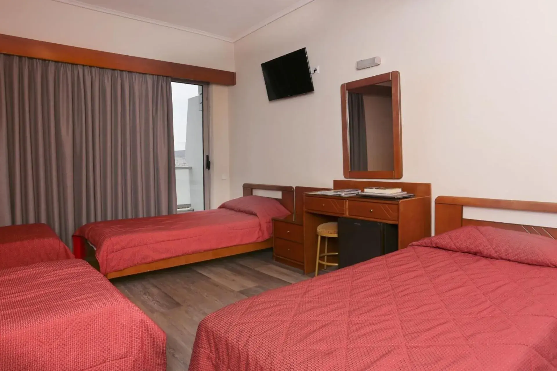 Bed in Xenophon Hotel Bed in Xenophon Hotel