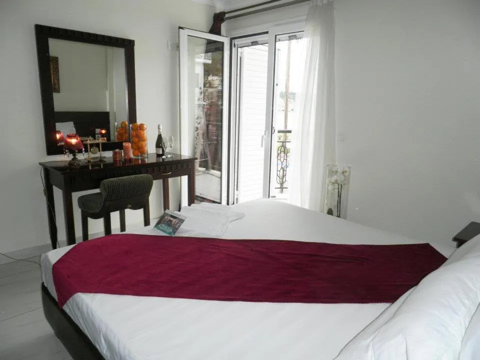 Bed in Arcadia Suites & Spa