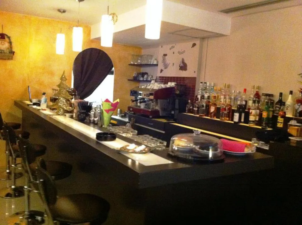 Communal lounge/ TV room in Arcadia Suites & Spa