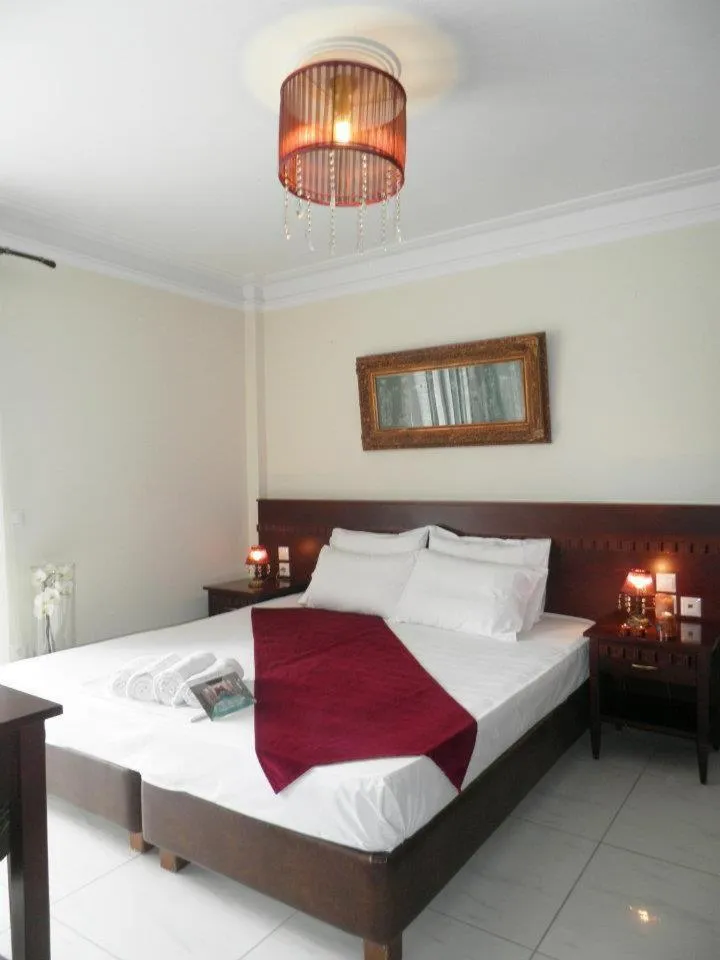 Bed in Arcadia Suites & Spa