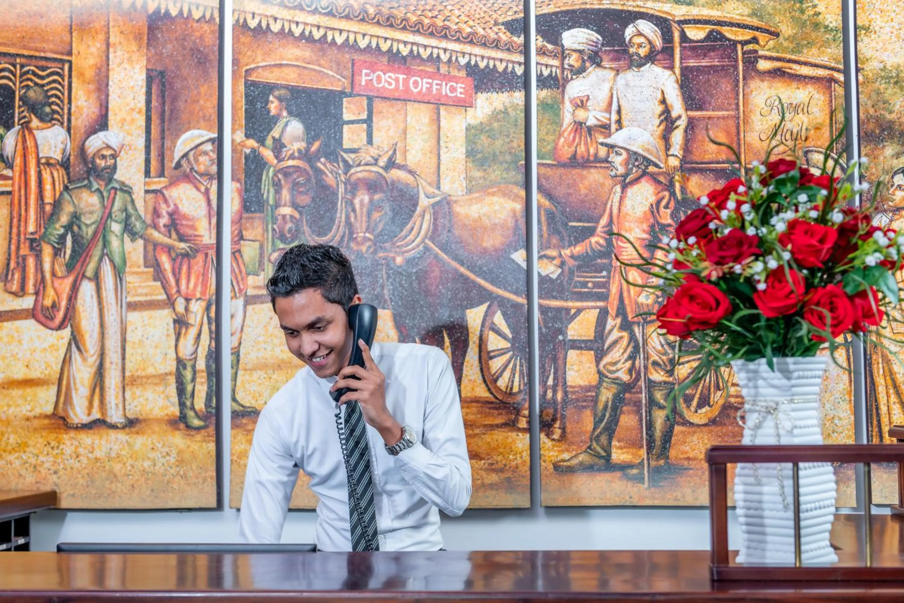 Staff in Earl's Red Colombo