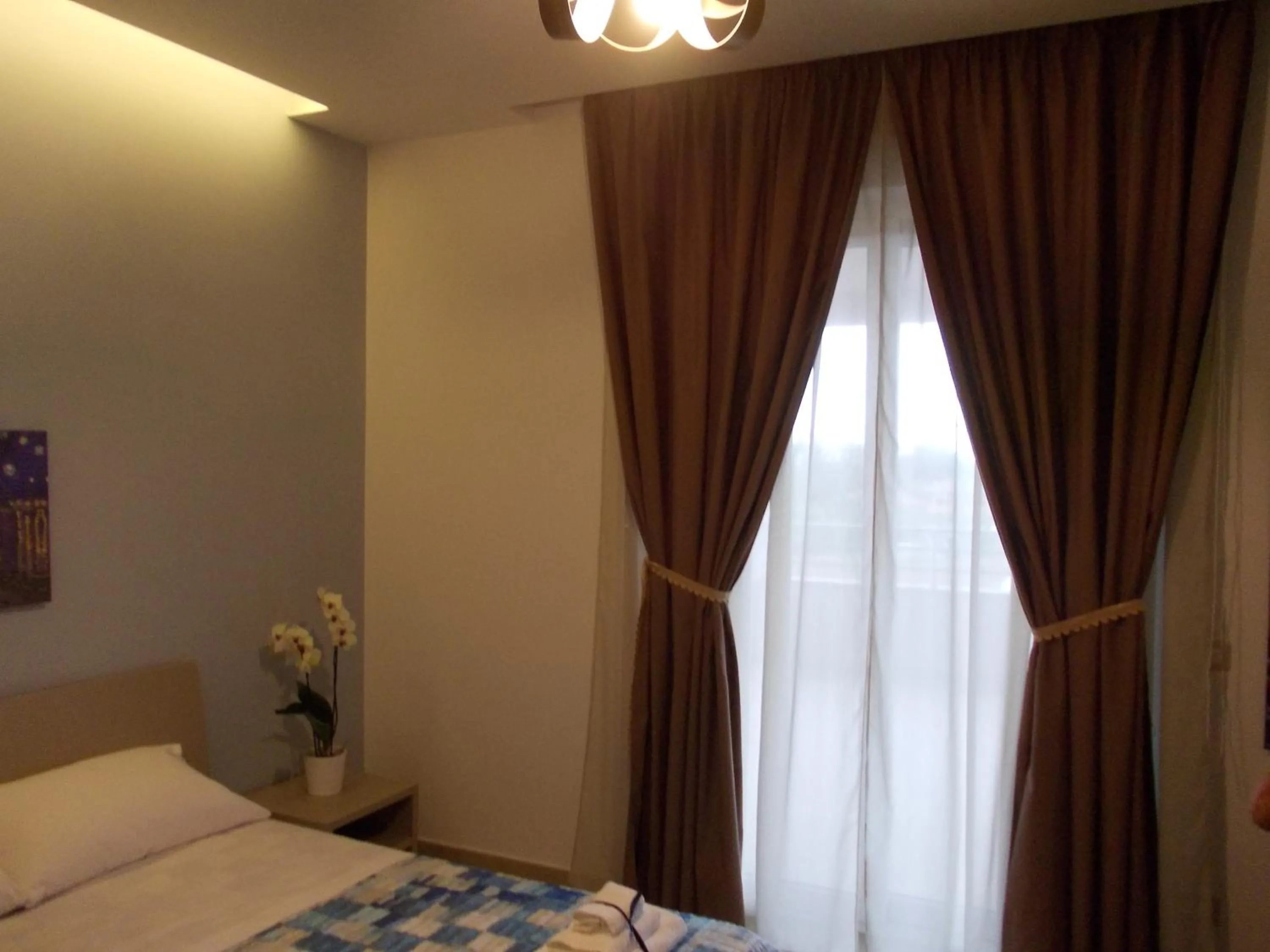 Bed in VILLA LAURO LUXURY B&B