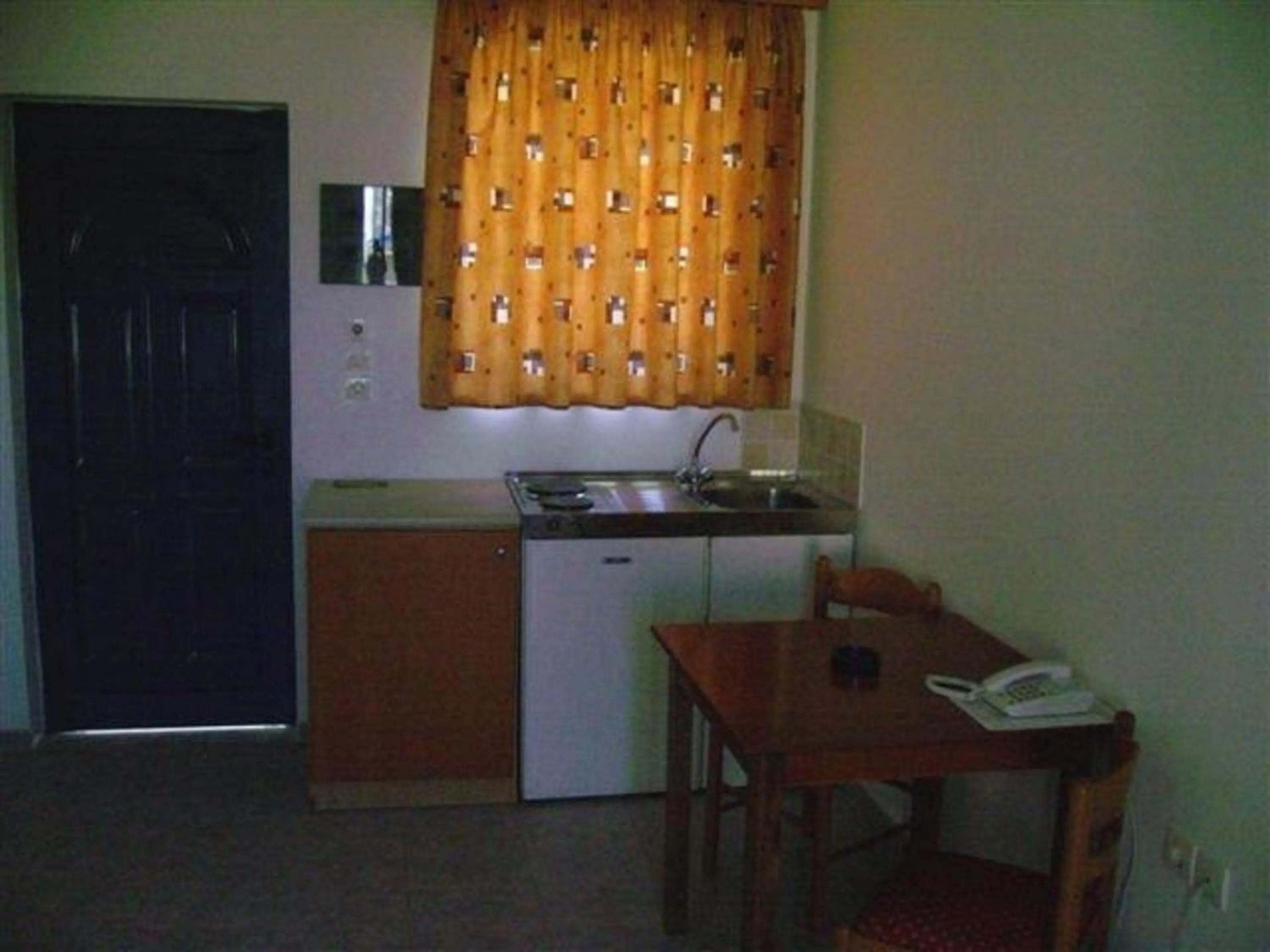 Kitchen or kitchenette in Stegna Star Apartments