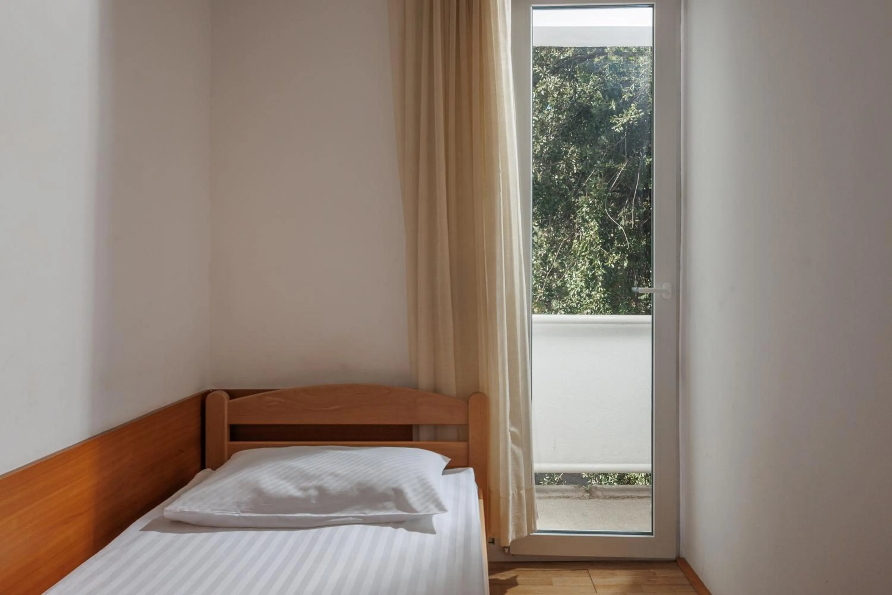 Bed in Boarding House Lucija