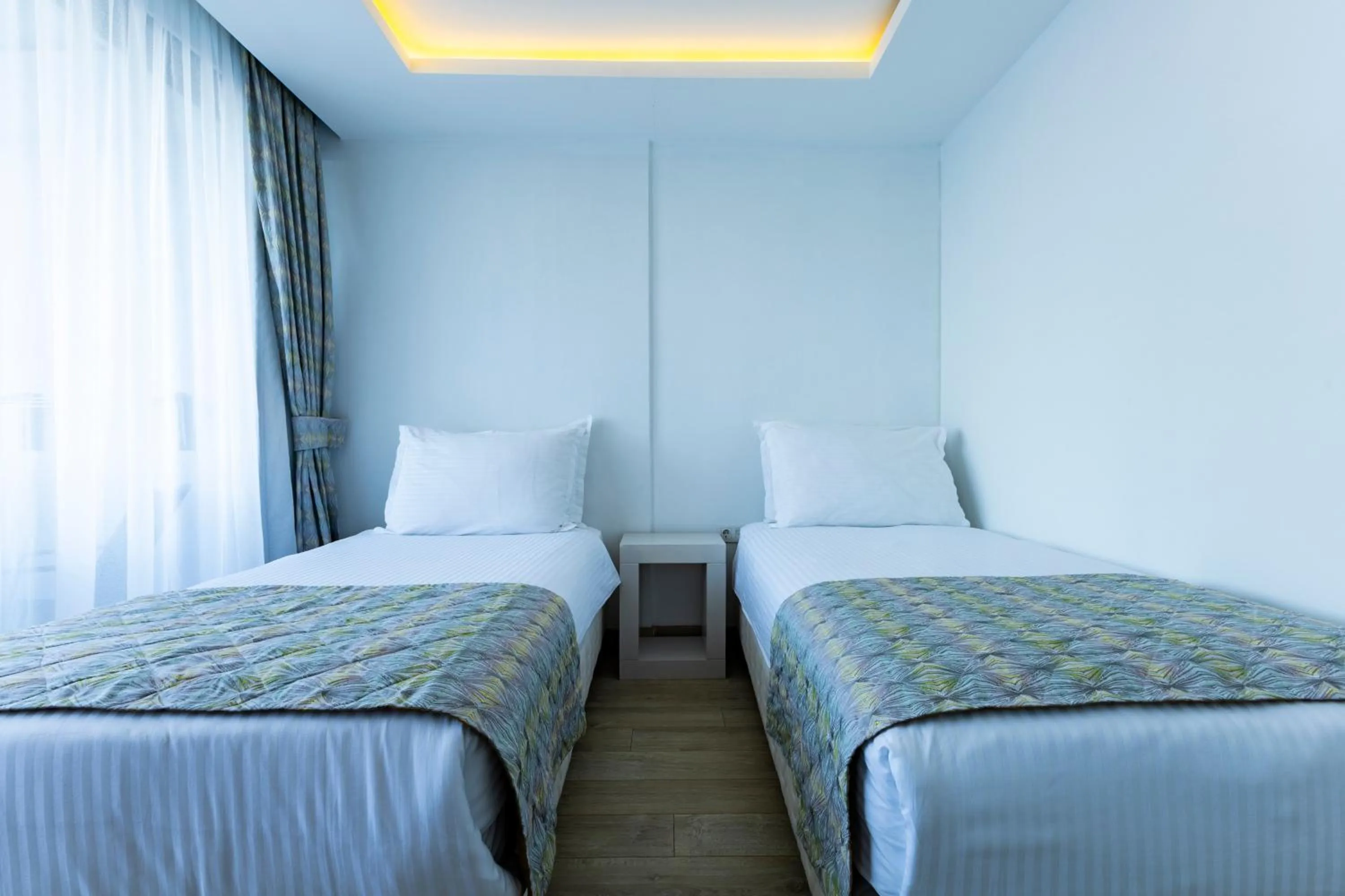 Bed in The Nowness Luxury Hotel & Spa Adulty Only