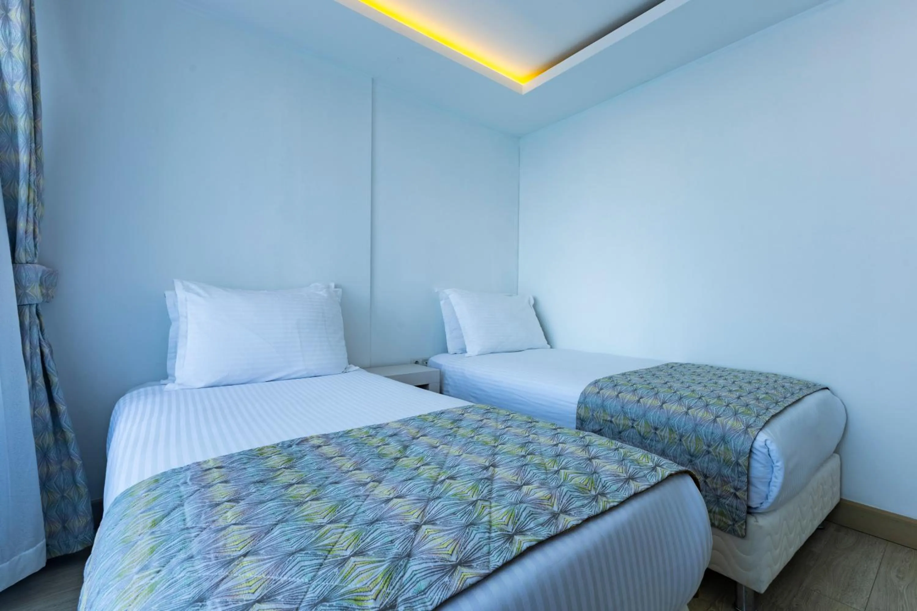 Bed in The Nowness Luxury Hotel & Spa Adulty Only