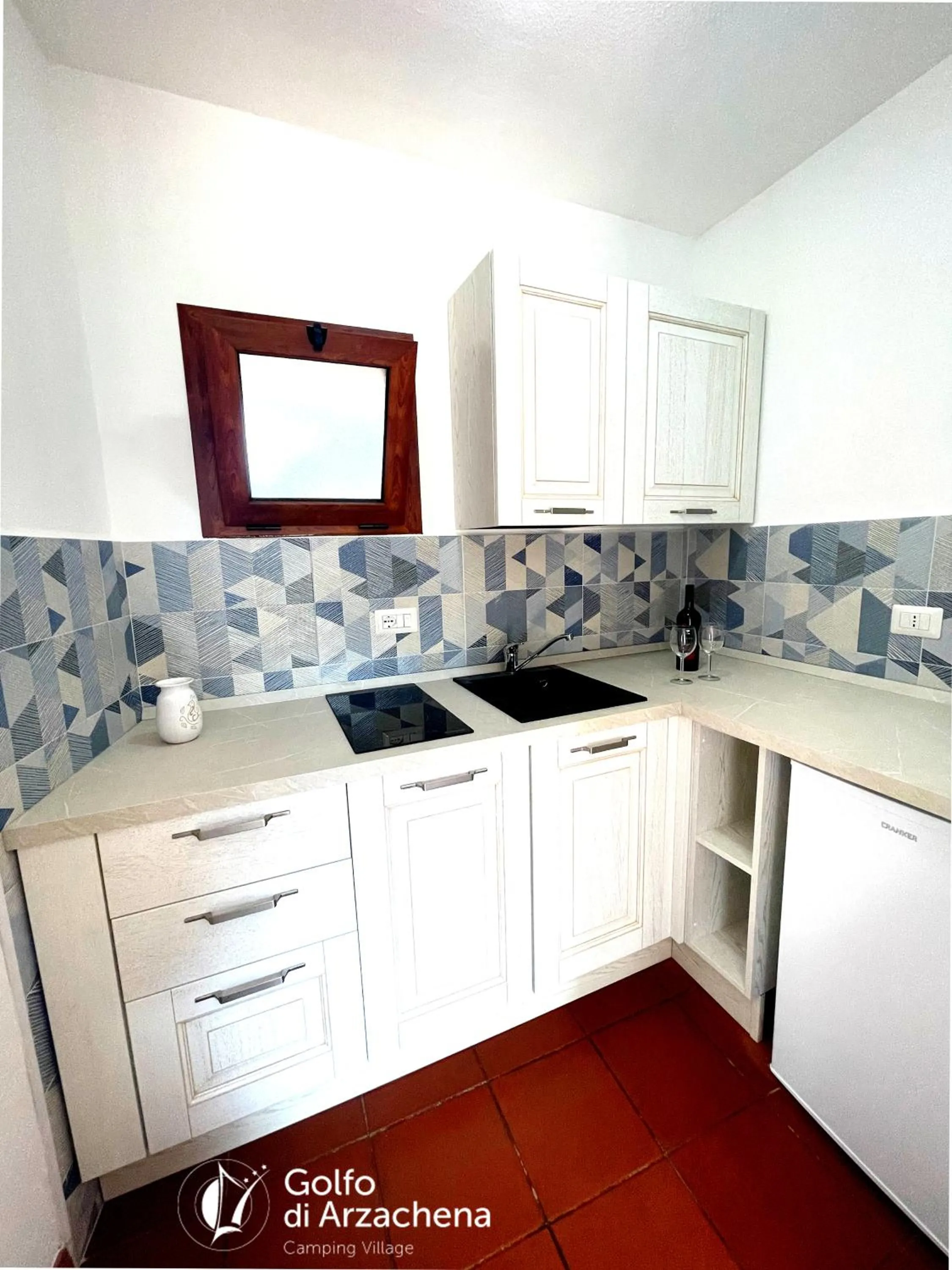 Kitchen or kitchenette in Villaggio Camping Golfo di Arzachena