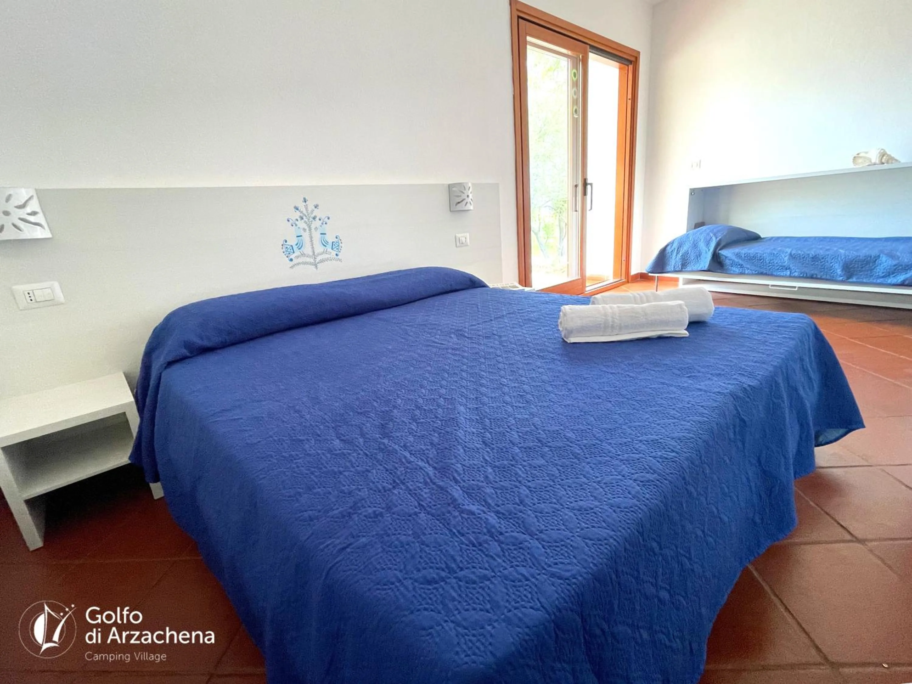 Bed in Villaggio Camping Golfo di Arzachena