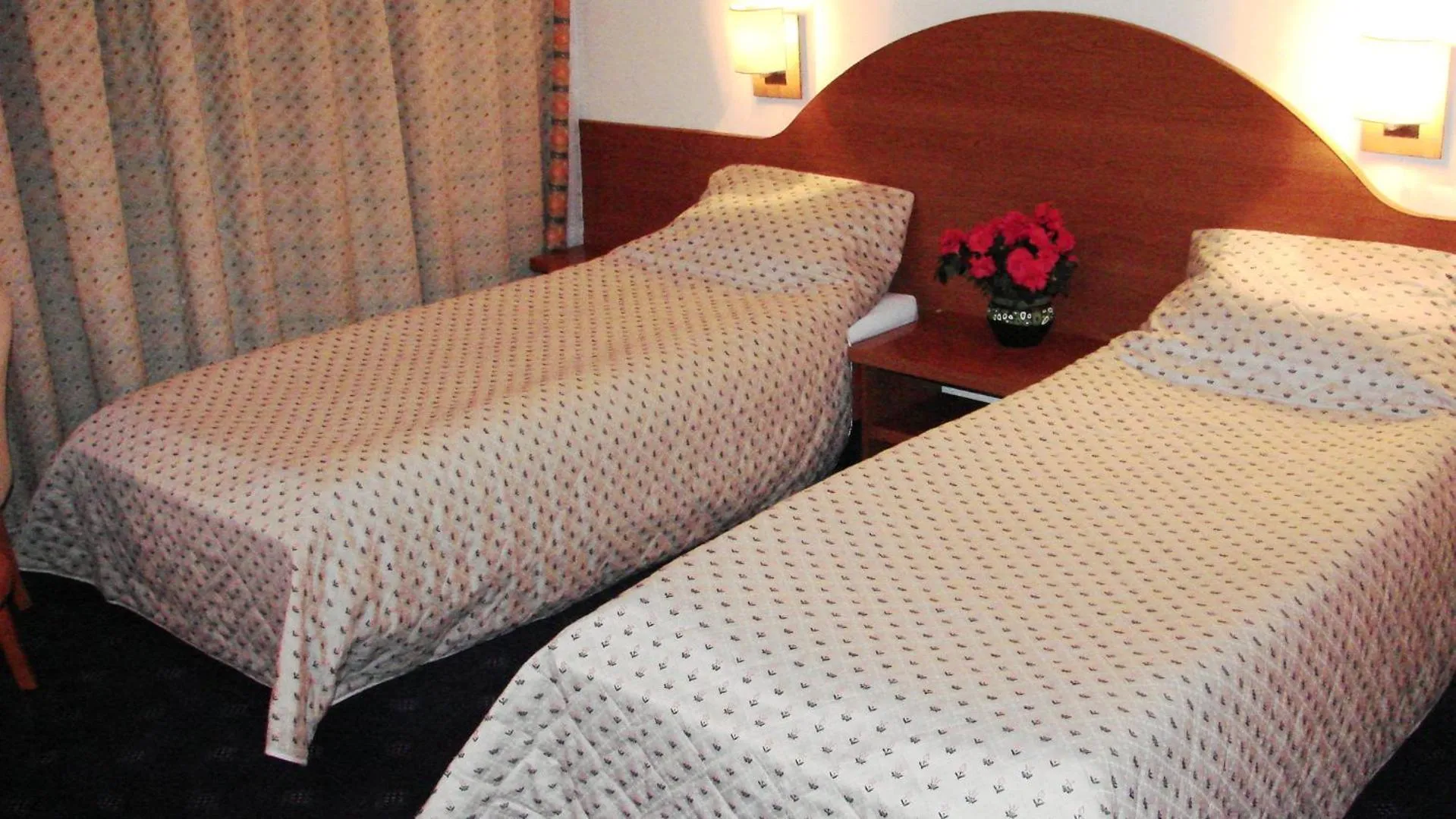 Bed in Hotel Irisa
