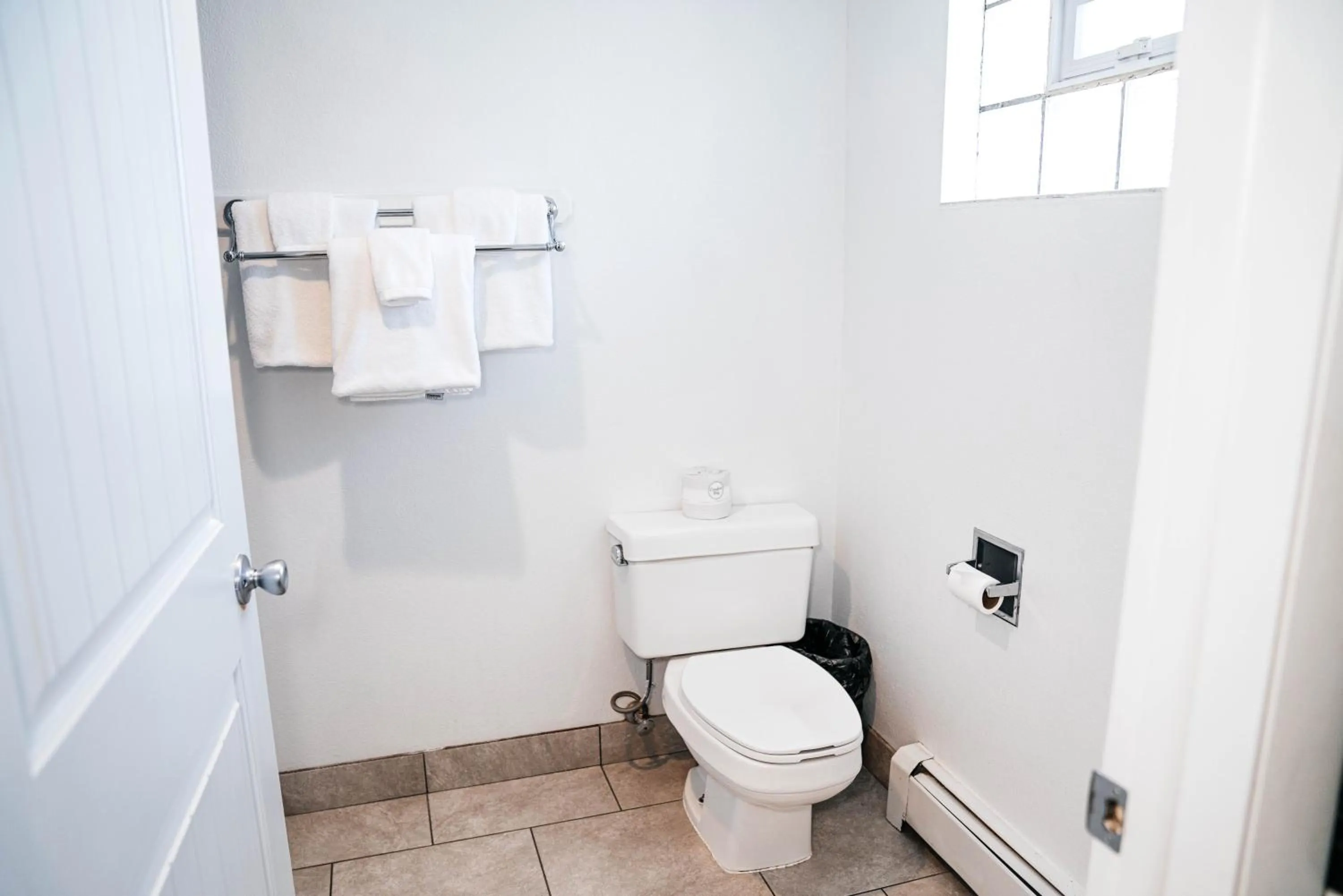Toilet in Salida Inn & Monarch Suites