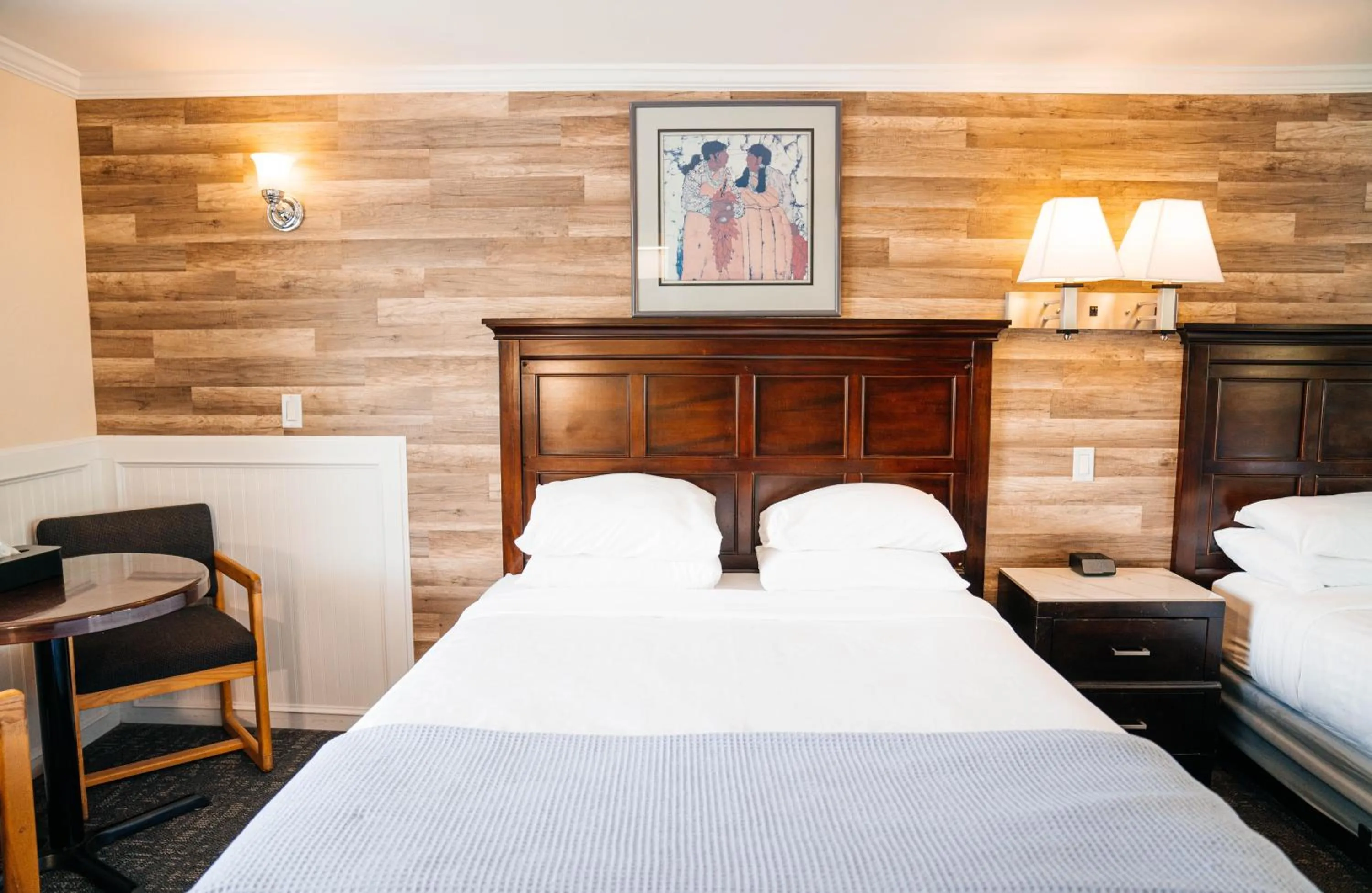 Bed in Salida Inn & Monarch Suites