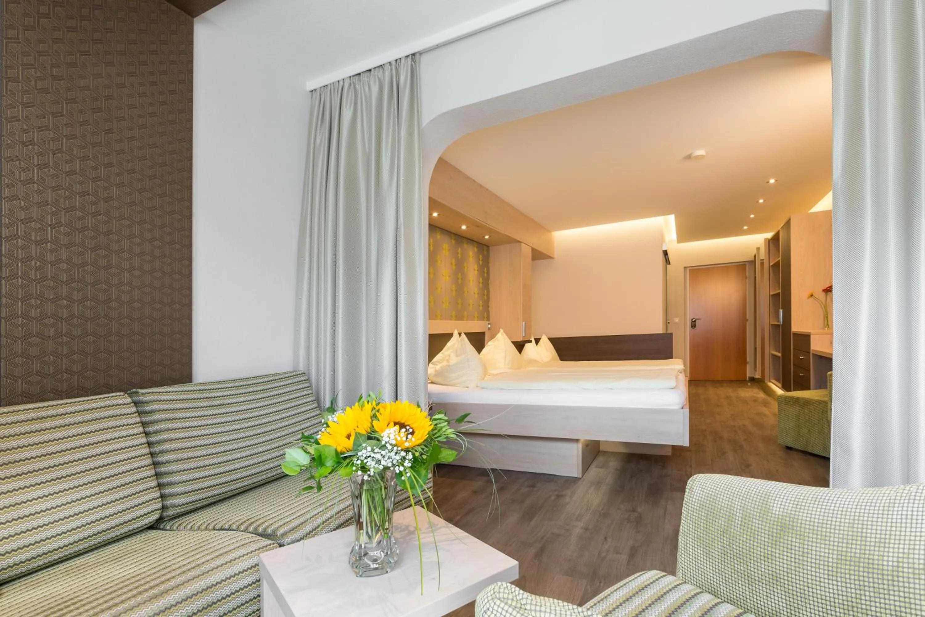 Living room, Bed in Bliem's Familienhotel