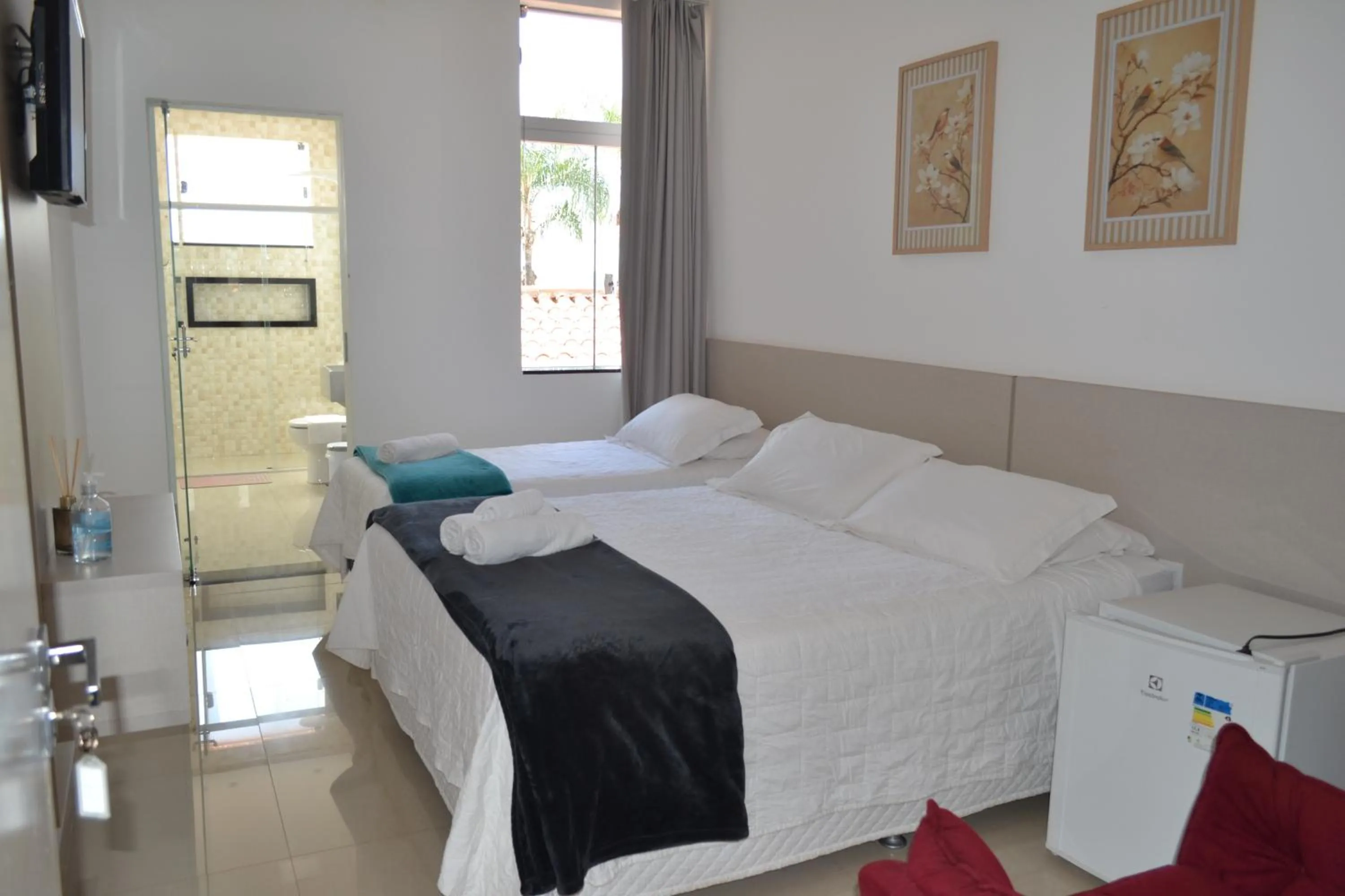 Bedroom, Bed in Pousada Suítes do Lago