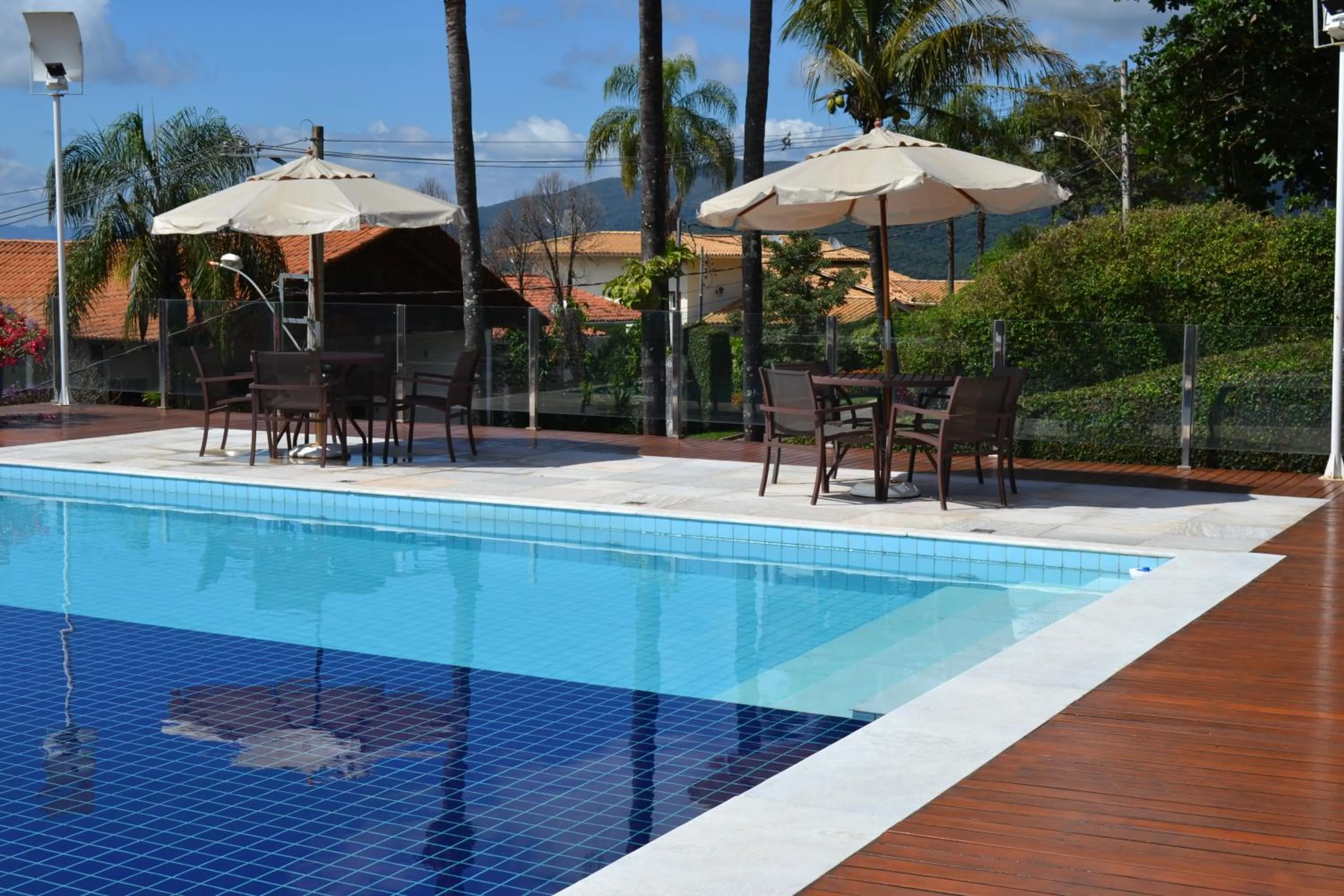 Swimming pool in Pousada Suítes do Lago