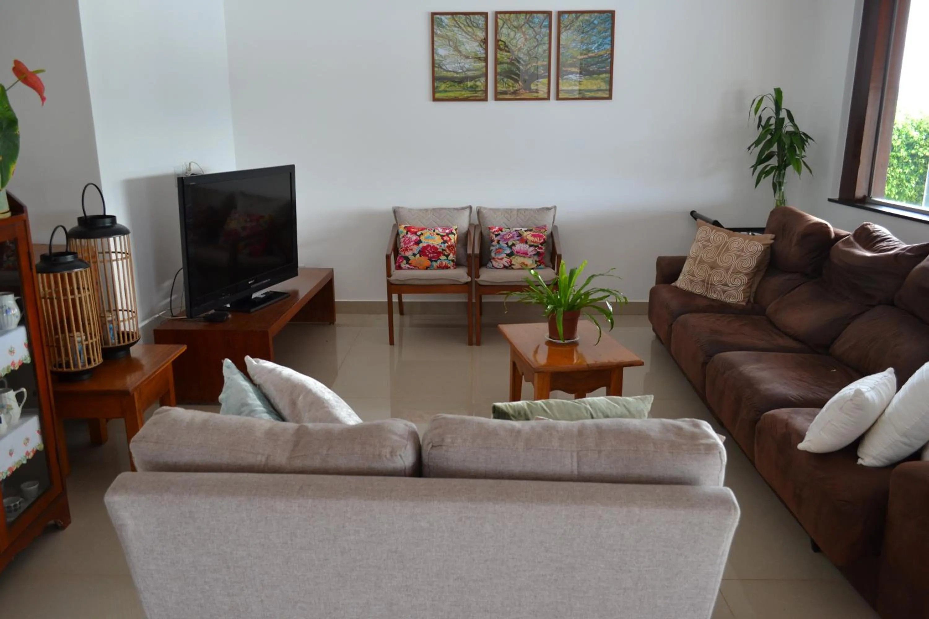 Living room in Pousada Suítes do Lago