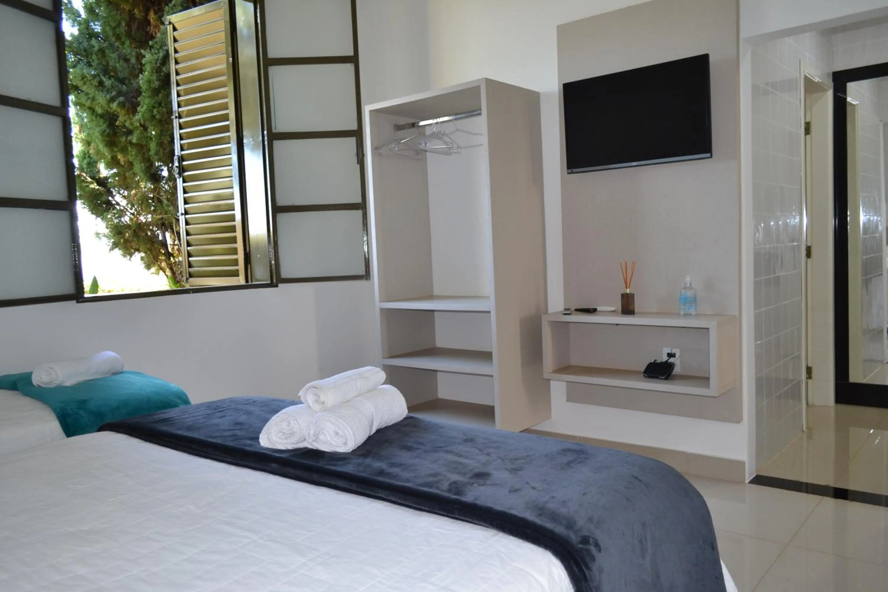 Bedroom, Bed in Pousada Suítes do Lago