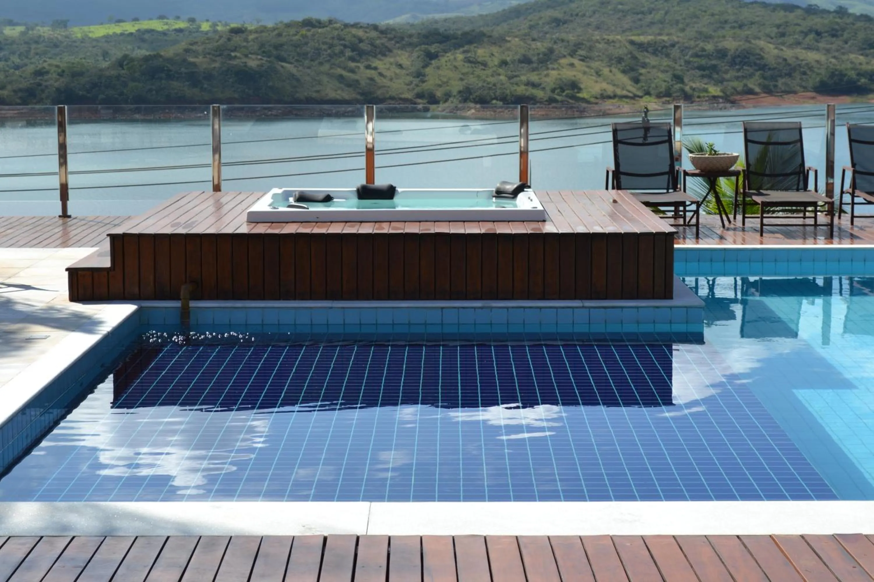 Swimming pool in Pousada Suítes do Lago