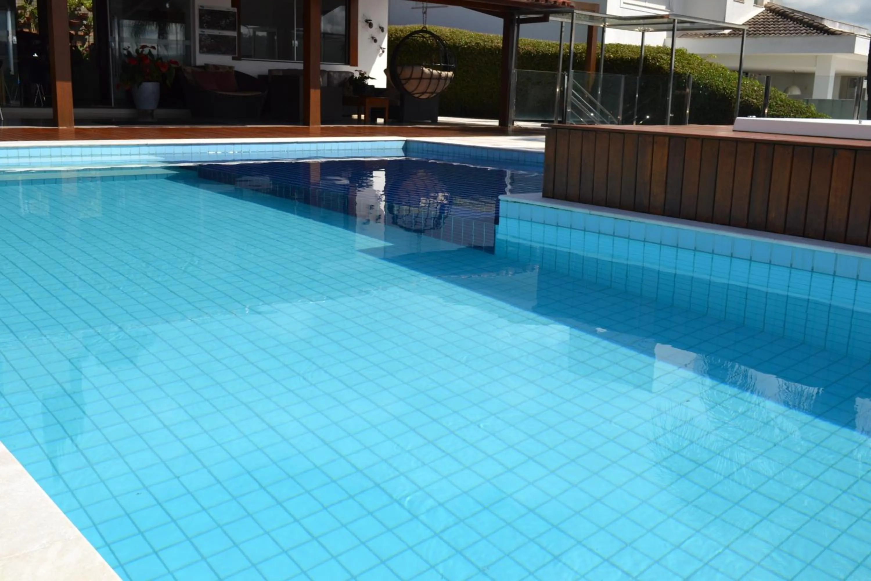 Swimming pool in Pousada Suítes do Lago