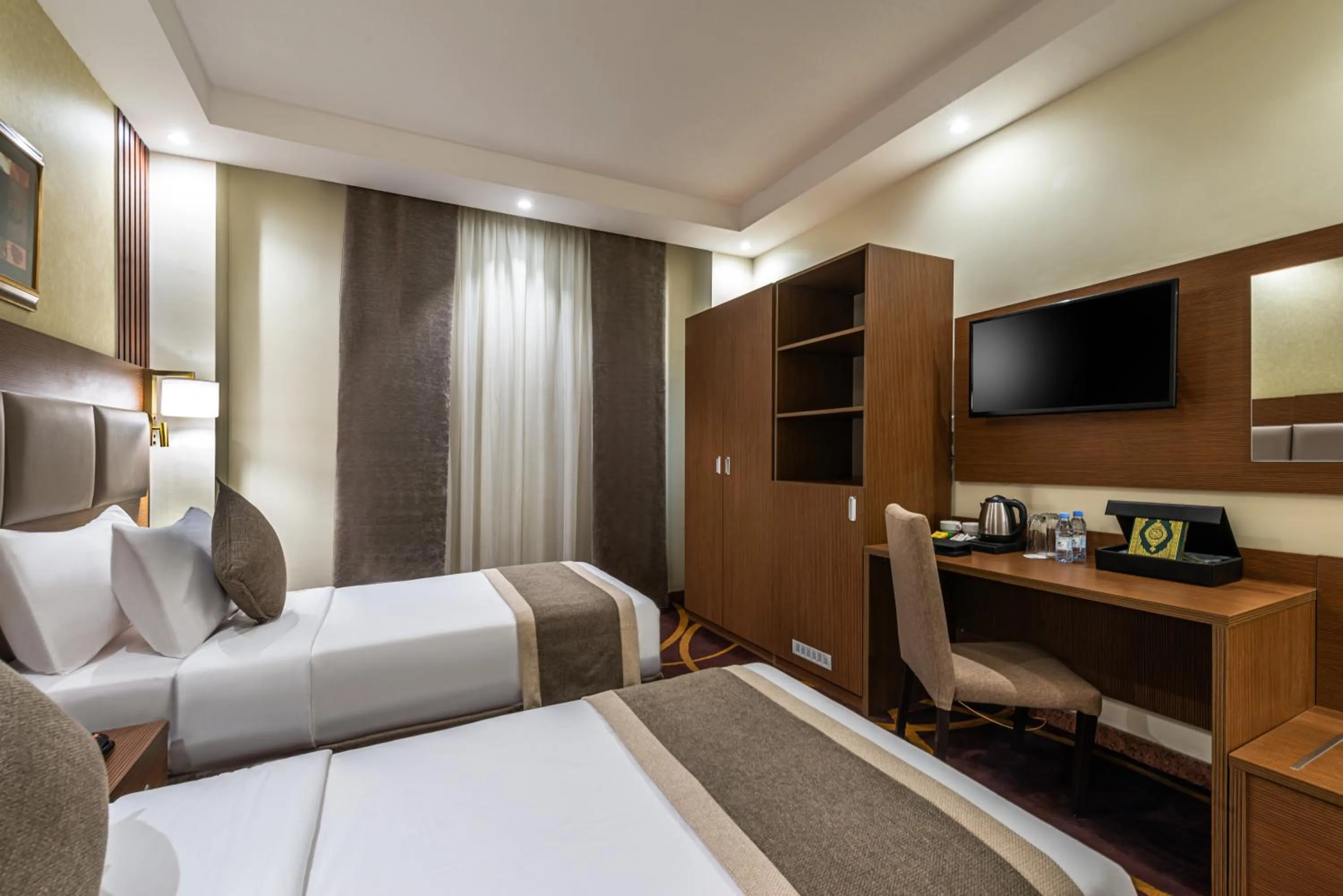 Bed in Al Ansar Palace Golden Tulip Hotel