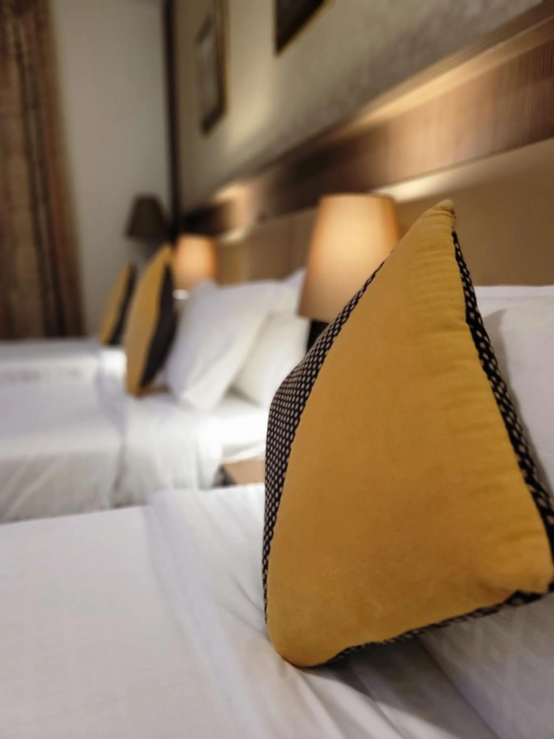 Bed in Al Ansar Palace Golden Tulip Hotel