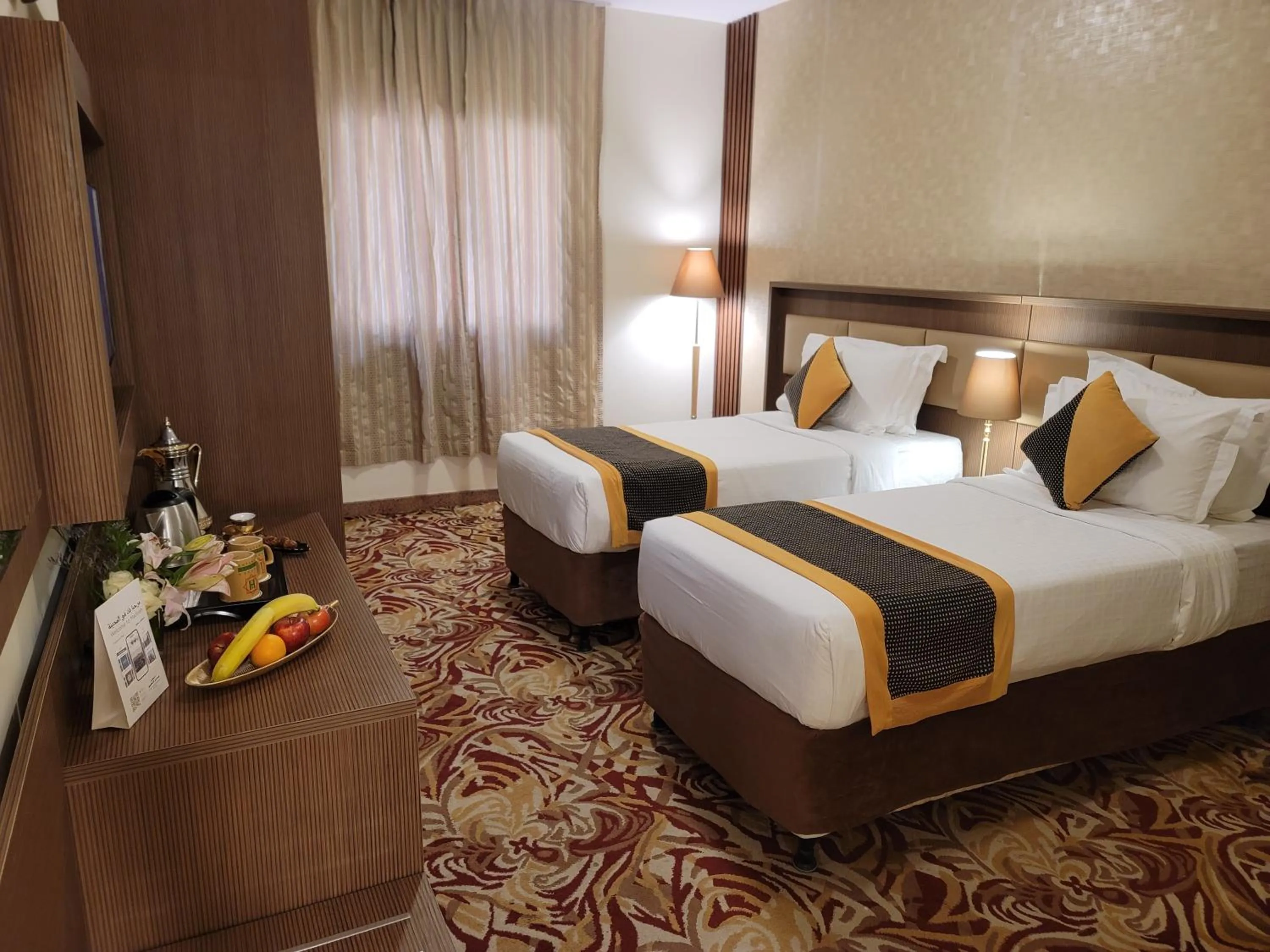 Bed in Al Ansar Palace Golden Tulip Hotel