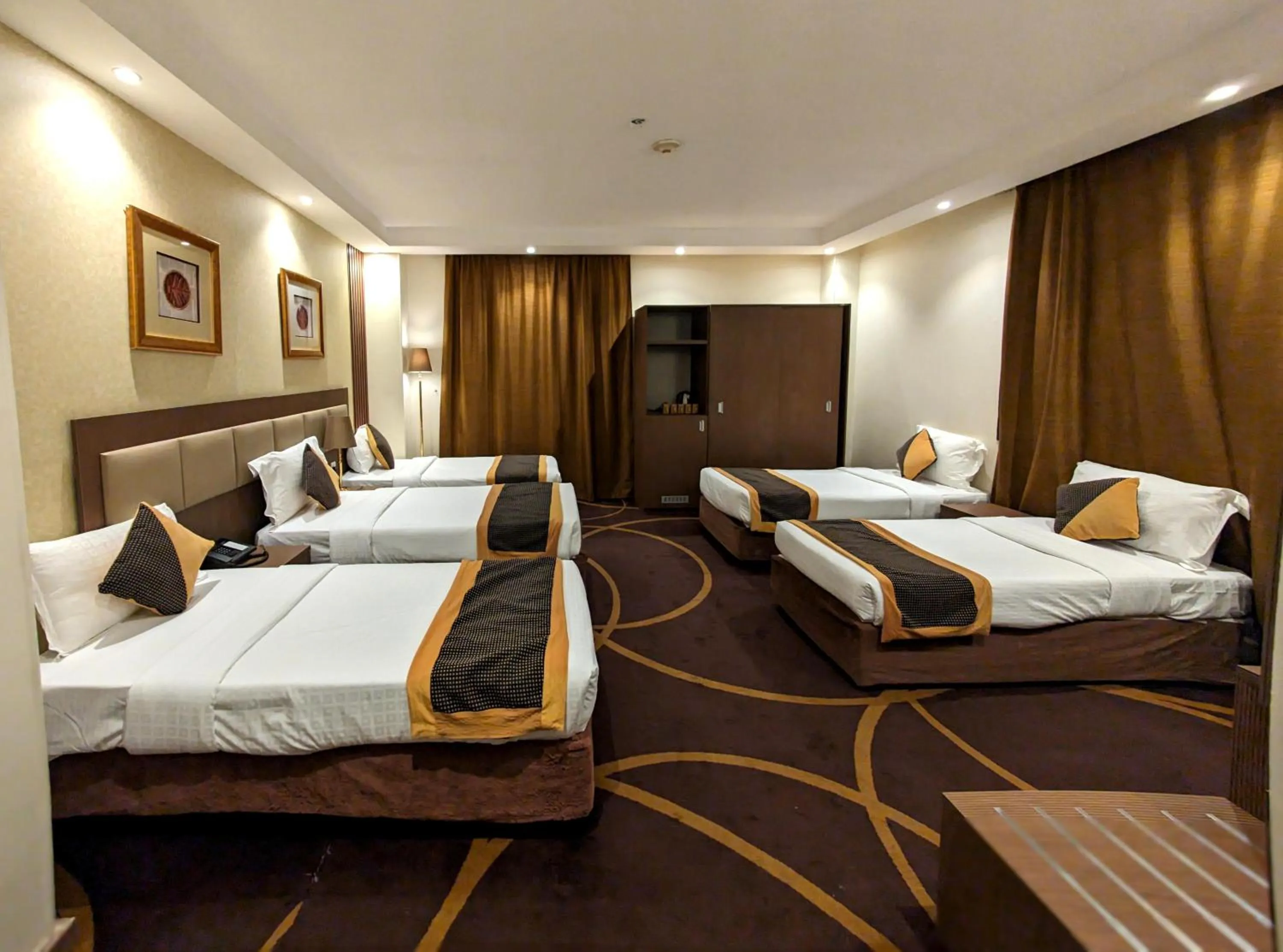 Bed in Al Ansar Palace Golden Tulip Hotel