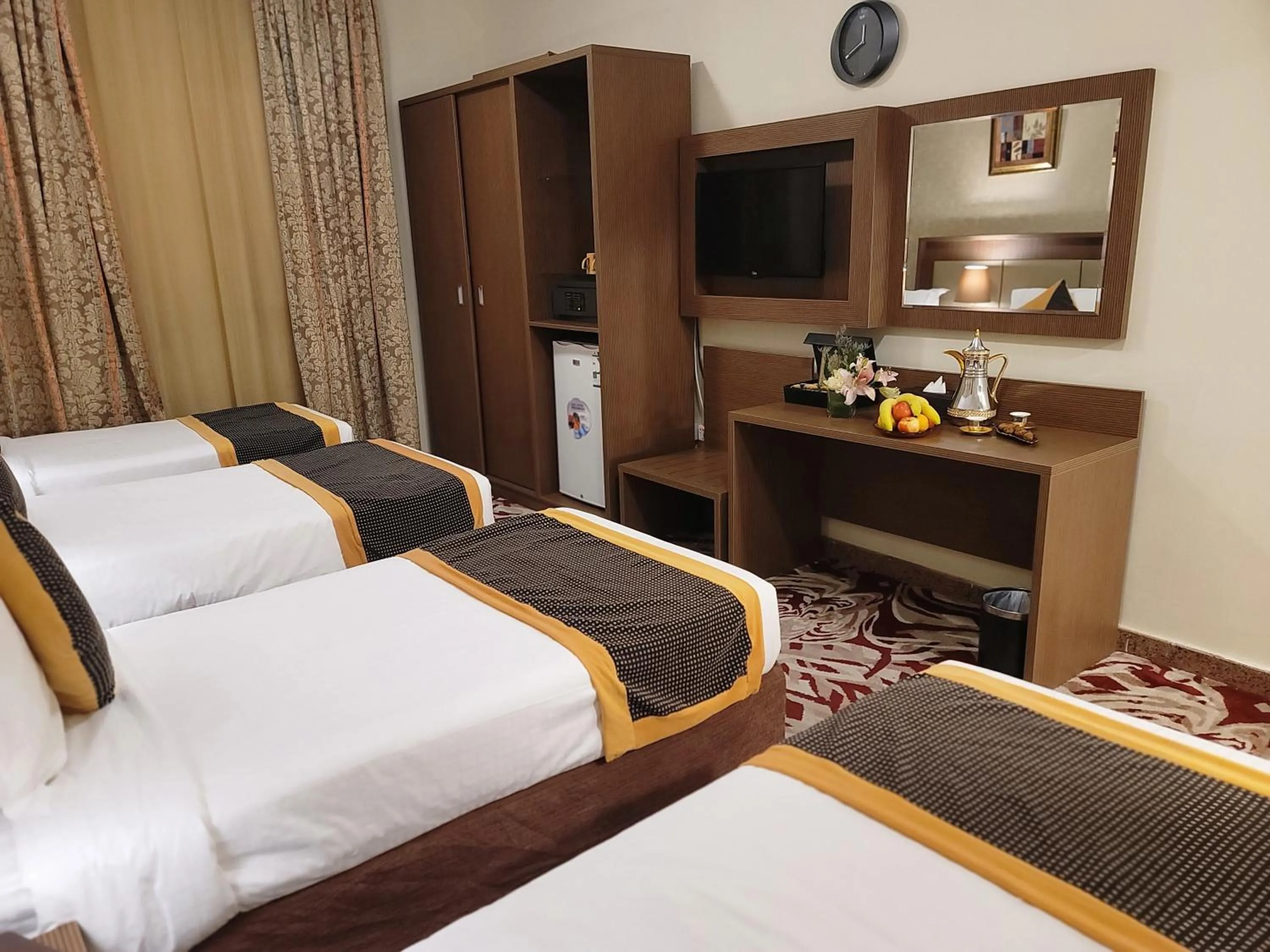 Bed in Al Ansar Palace Golden Tulip Hotel