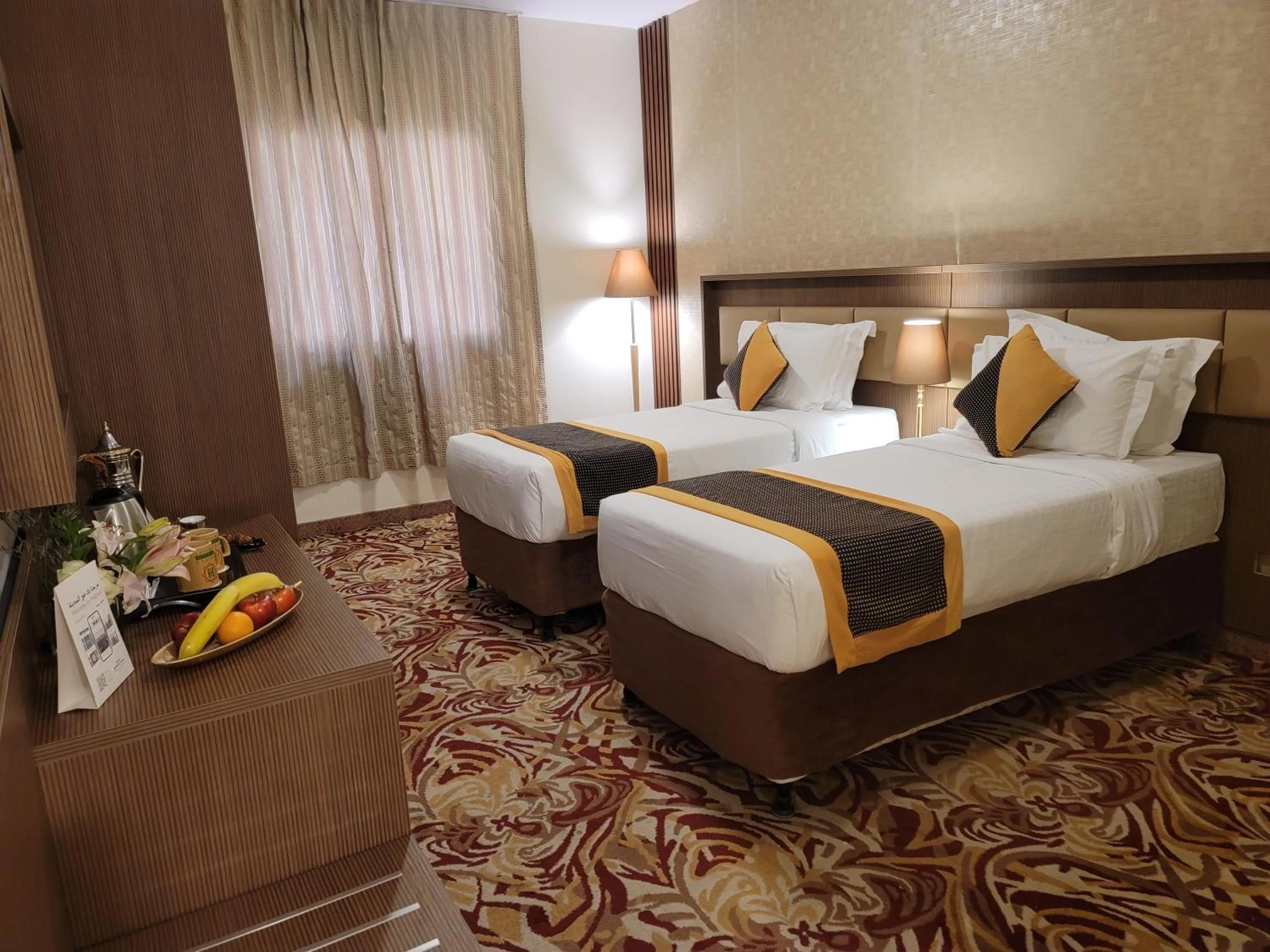 Bed in Al Ansar Palace Golden Tulip Hotel