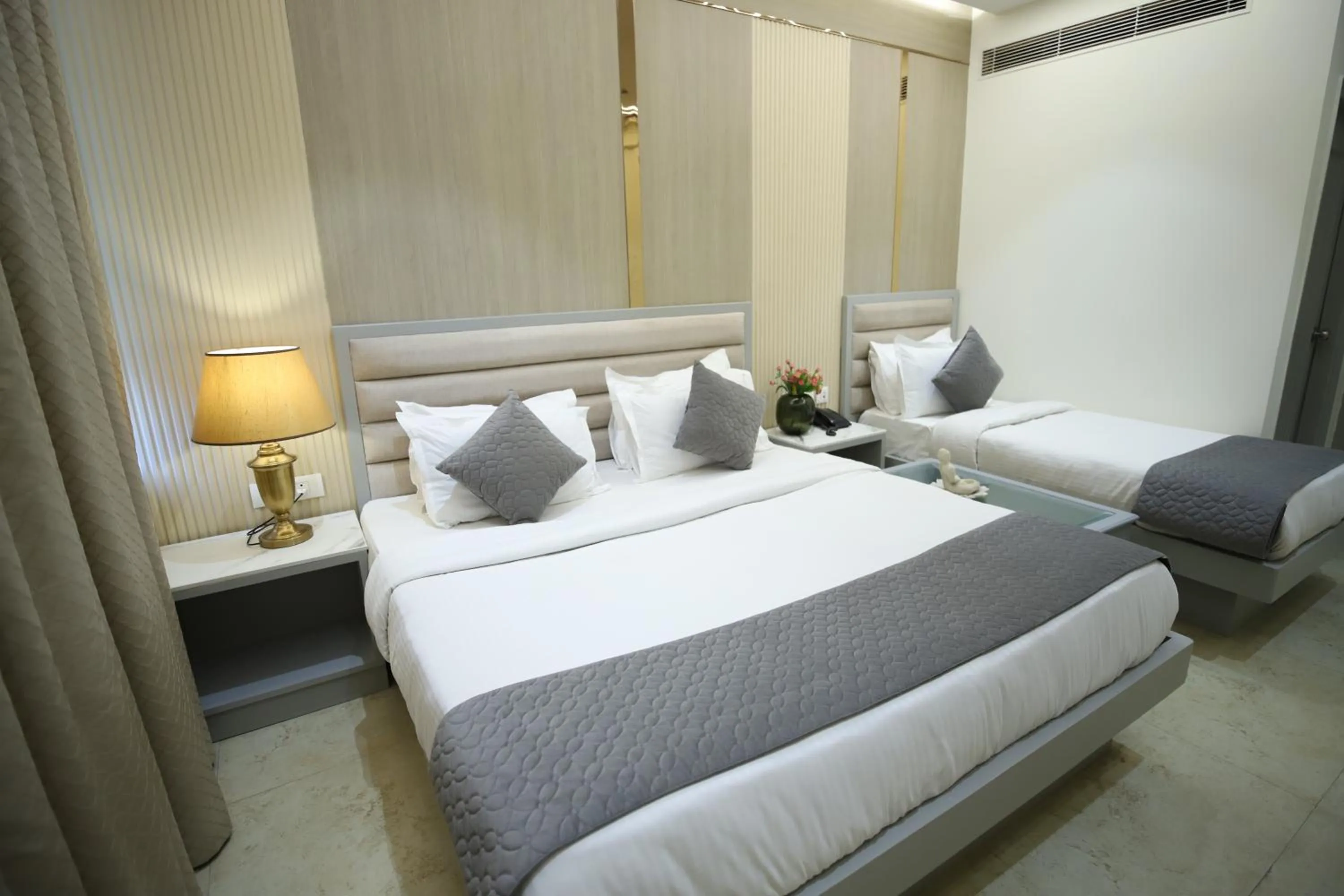 Bed in Hotel Sita International