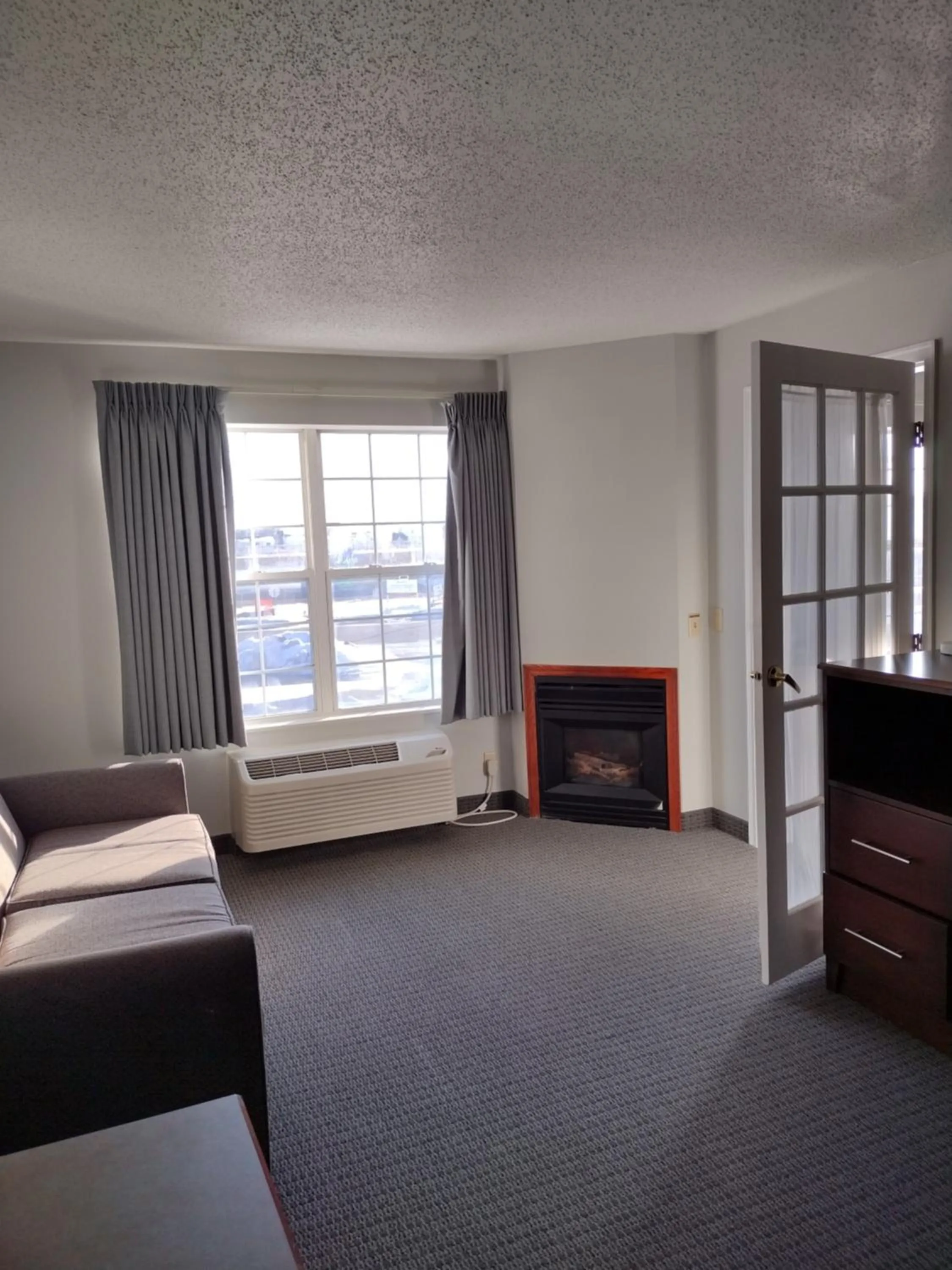 Bed in GrandStay Hotel & Suites Hastings