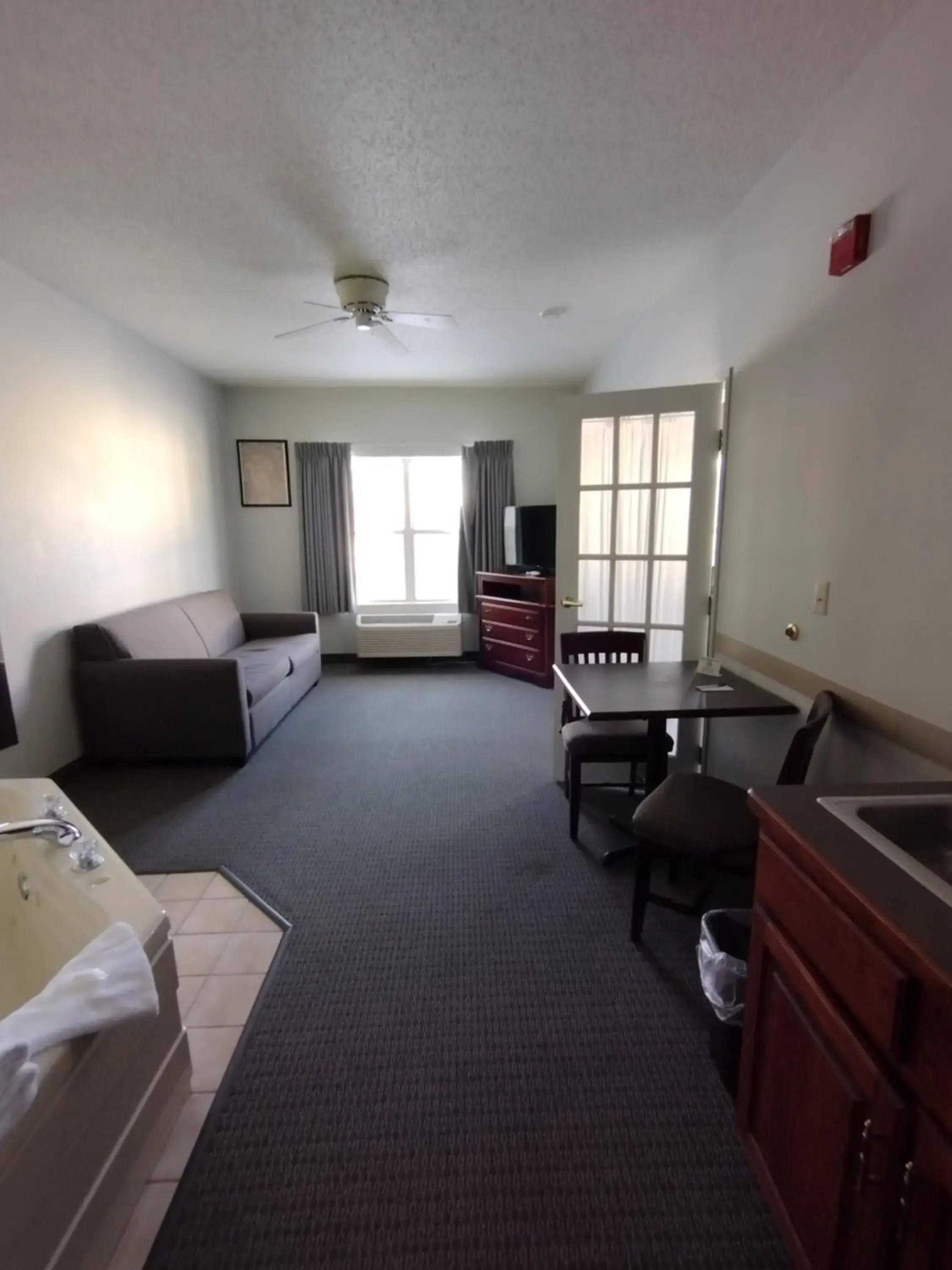 Bed in GrandStay Hotel & Suites Hastings Bed in GrandStay Hotel & Suites Hastings