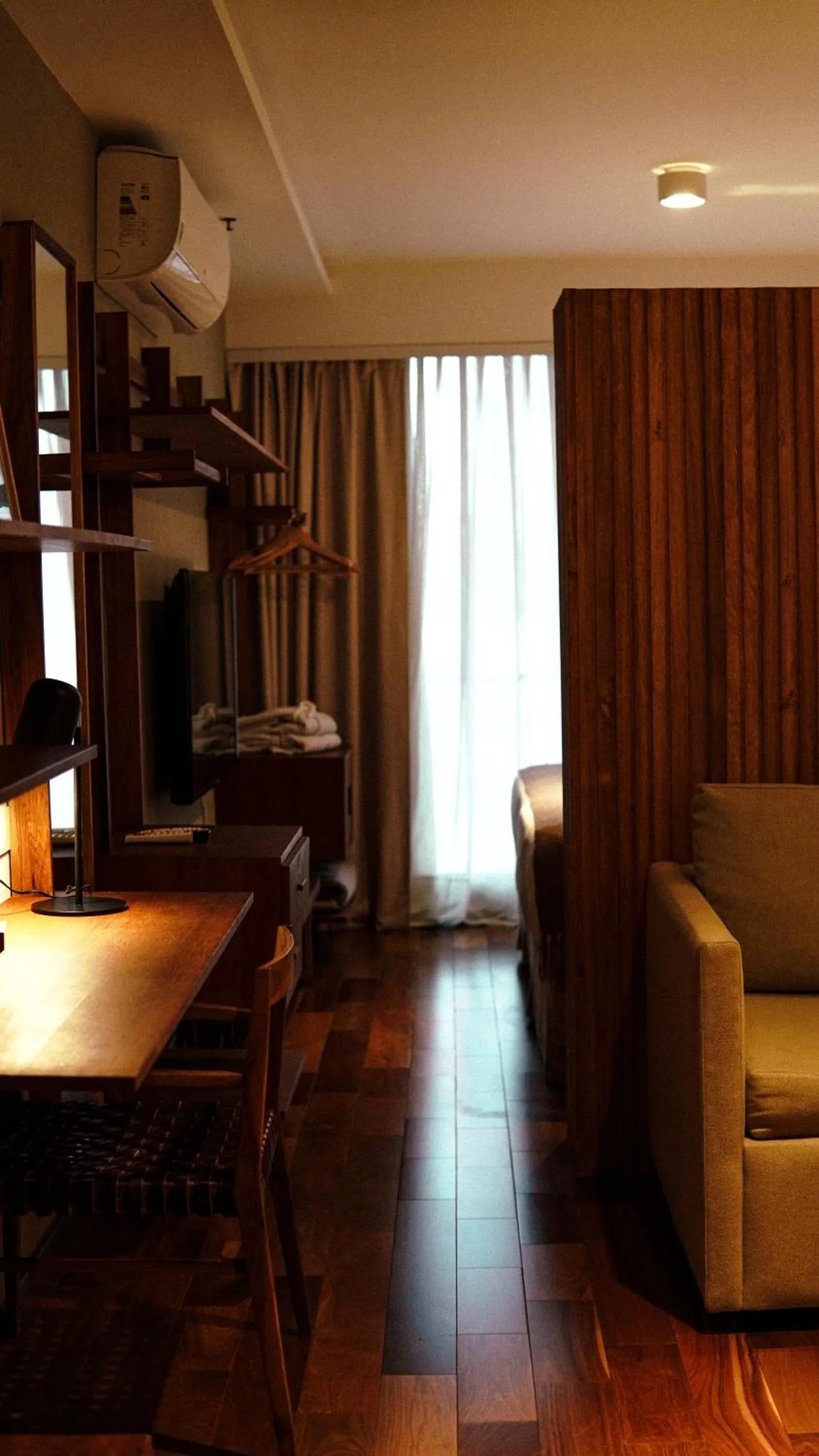 Bedroom in AQ Tailored Suites