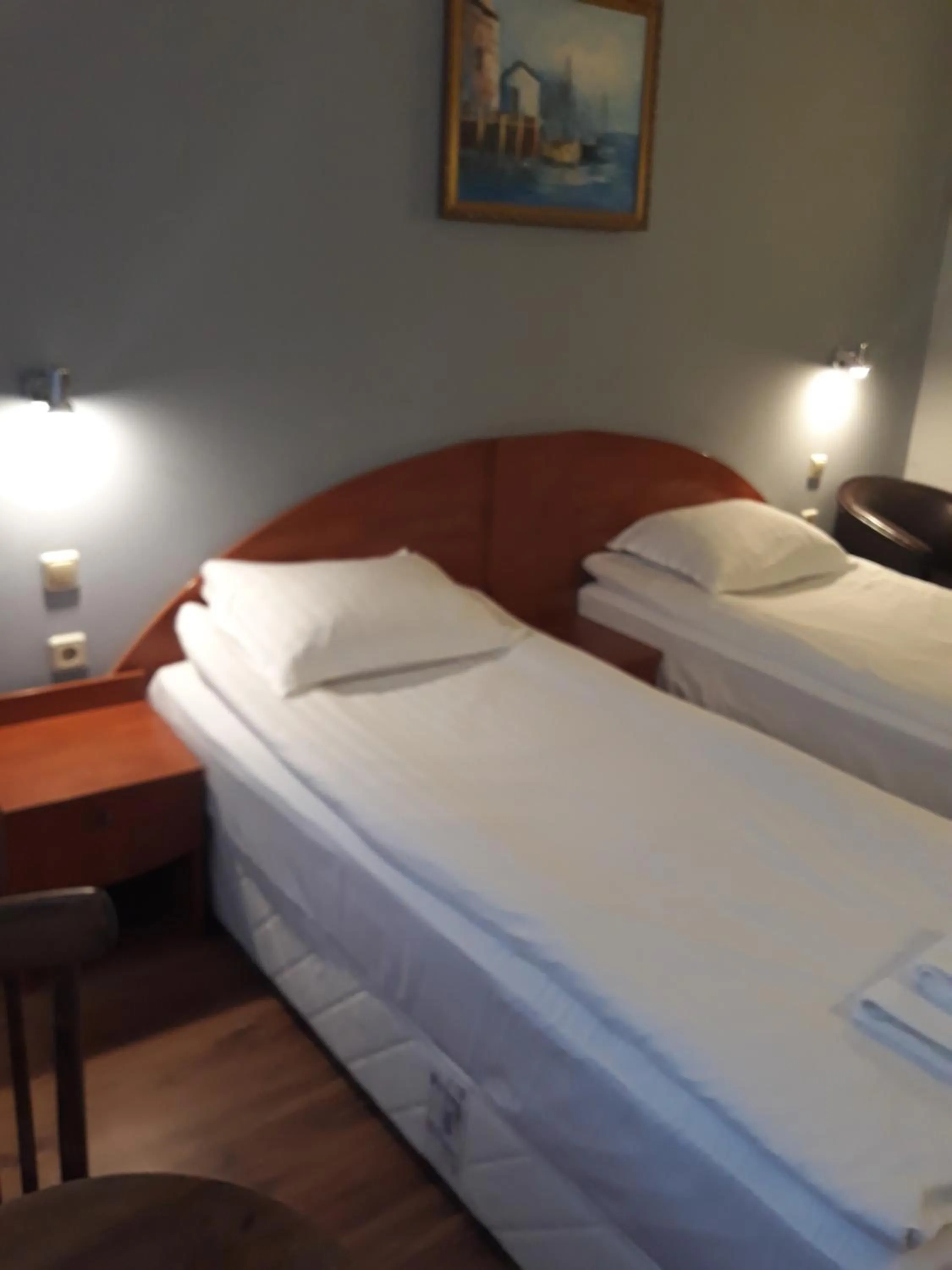 Bed in Three Dolphins Hotel with a Rooftop terracе