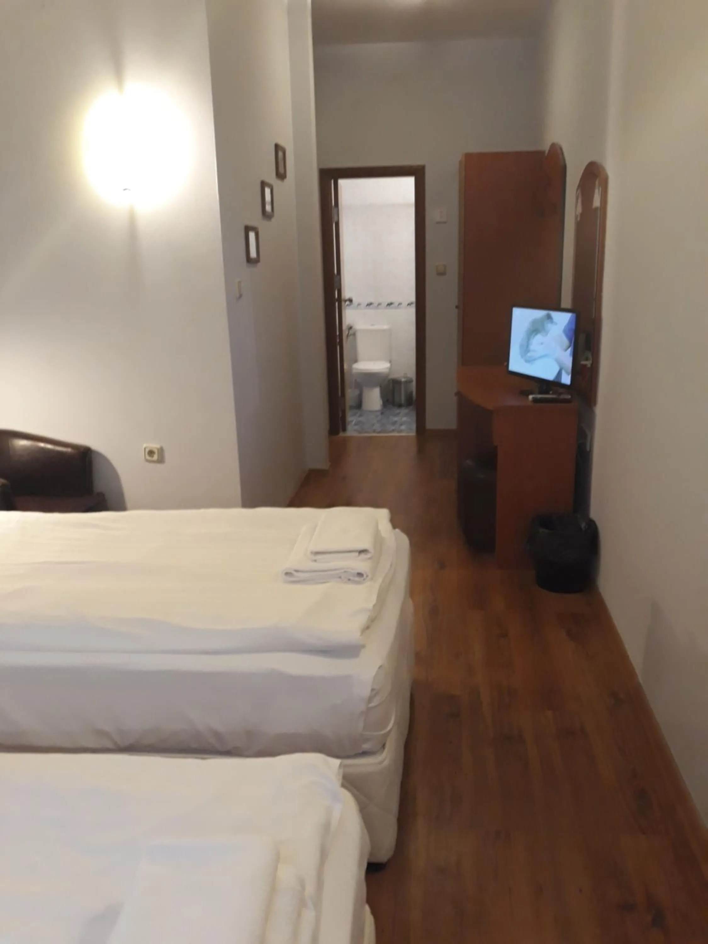 TV and multimedia, Bed in Three Dolphins Hotel with a Rooftop terracе