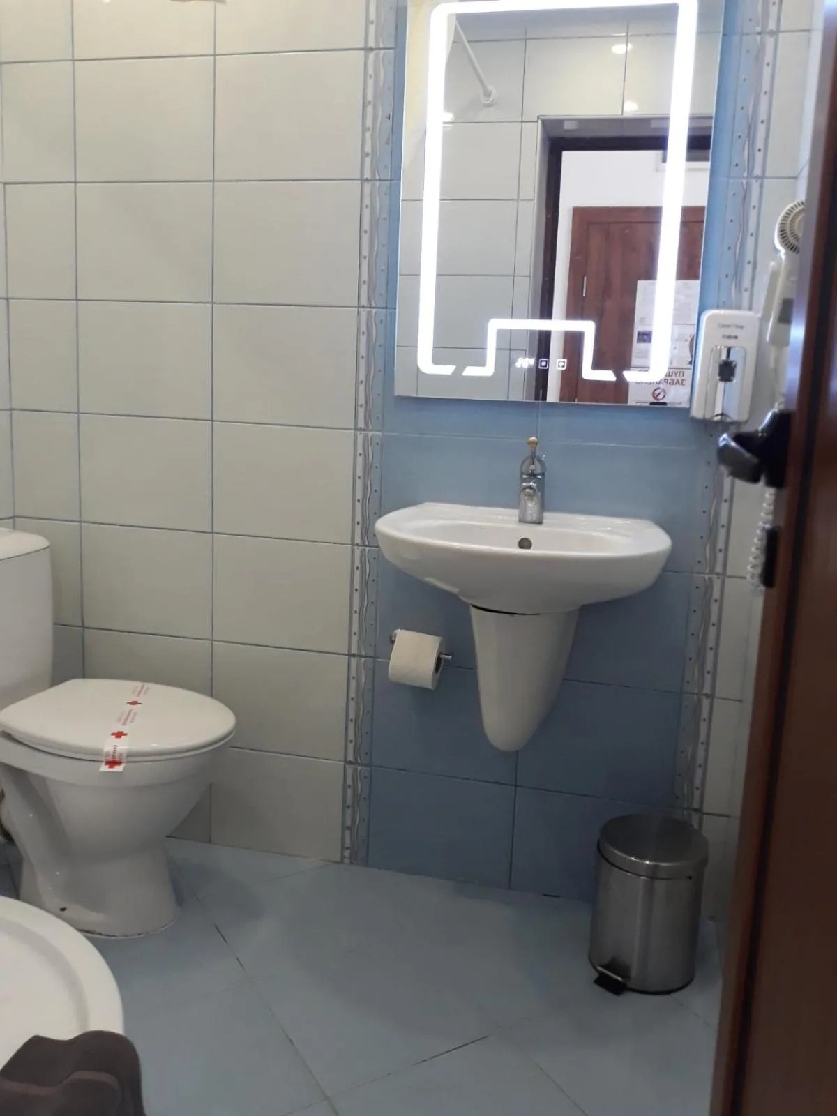 Bathroom in Three Dolphins Hotel with a Rooftop terracе