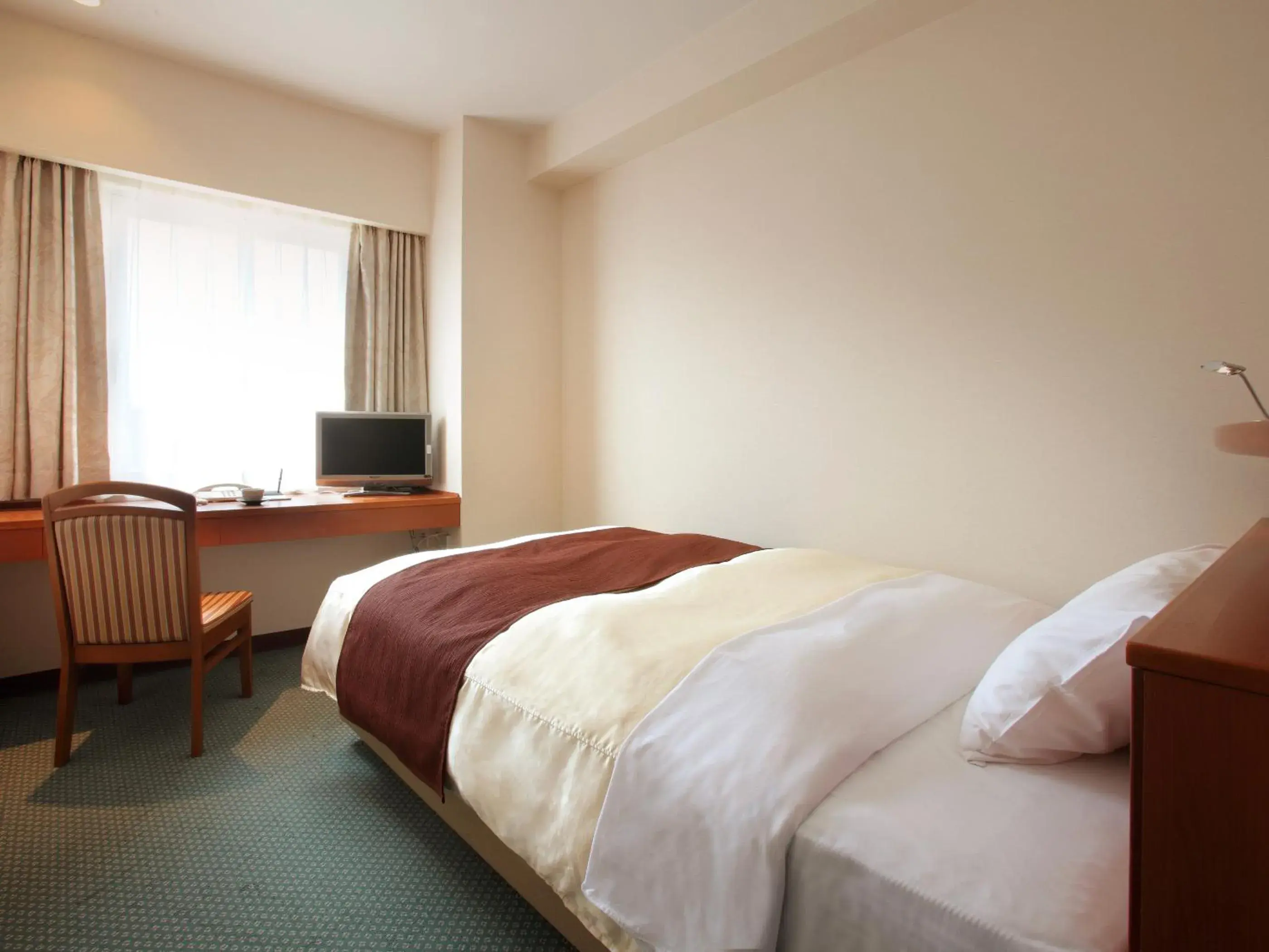 Photo of the whole room, Bed in Hotel Pearl City Morioka Photo of the whole room, Bed in Hotel Pearl City Morioka