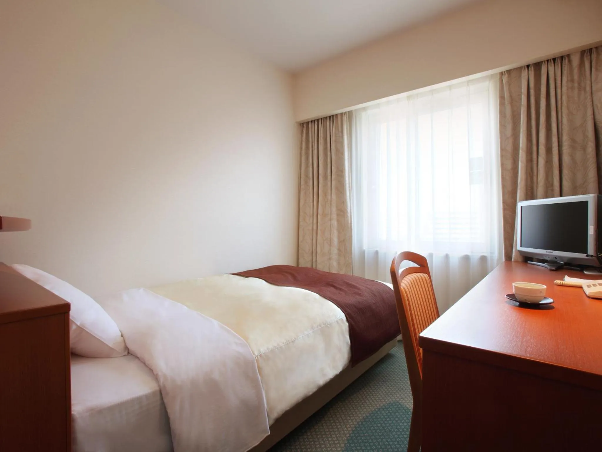 Photo of the whole room, Bed in Hotel Pearl City Morioka
