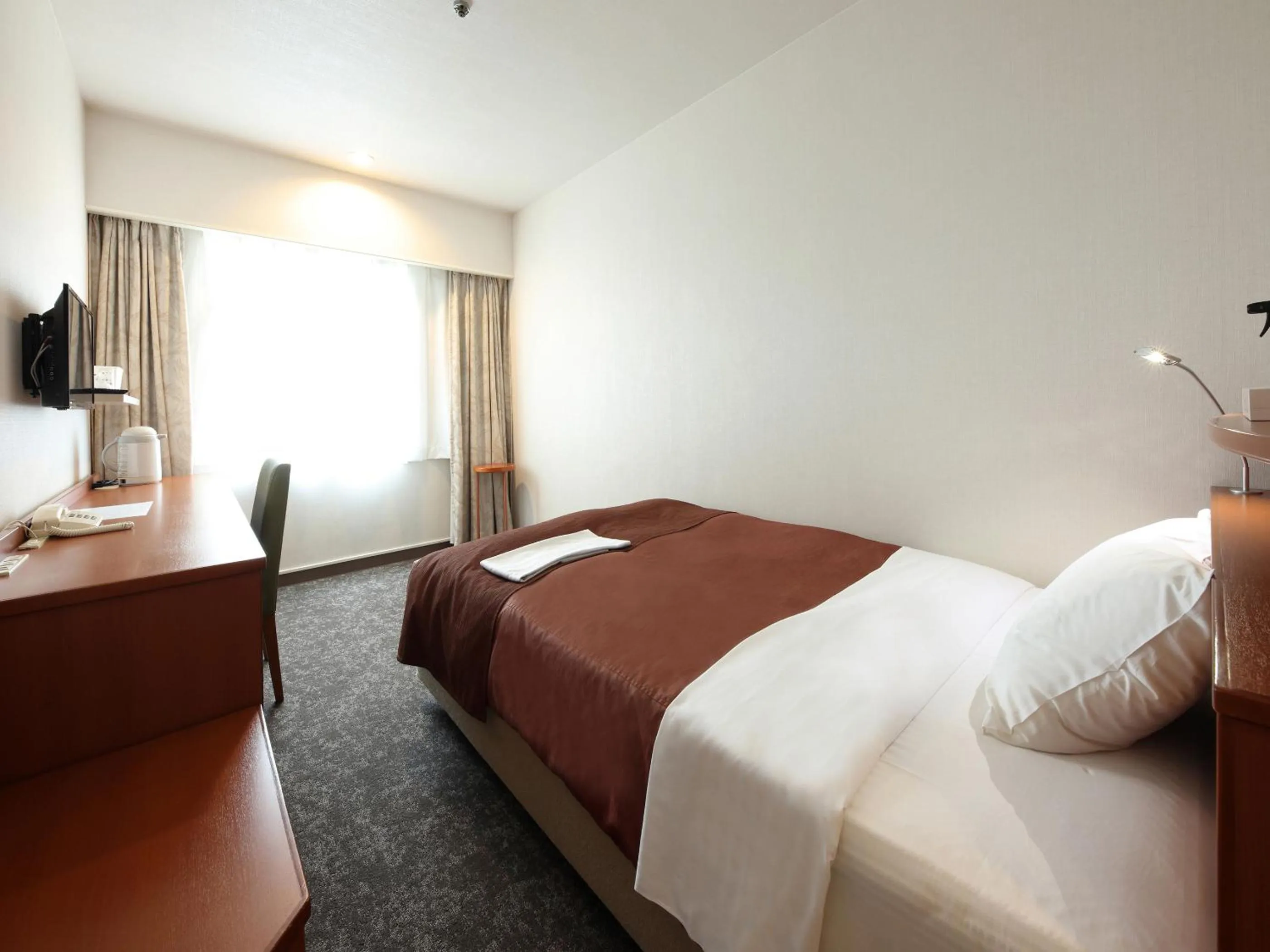 Photo of the whole room, Bed in Hotel Pearl City Morioka
