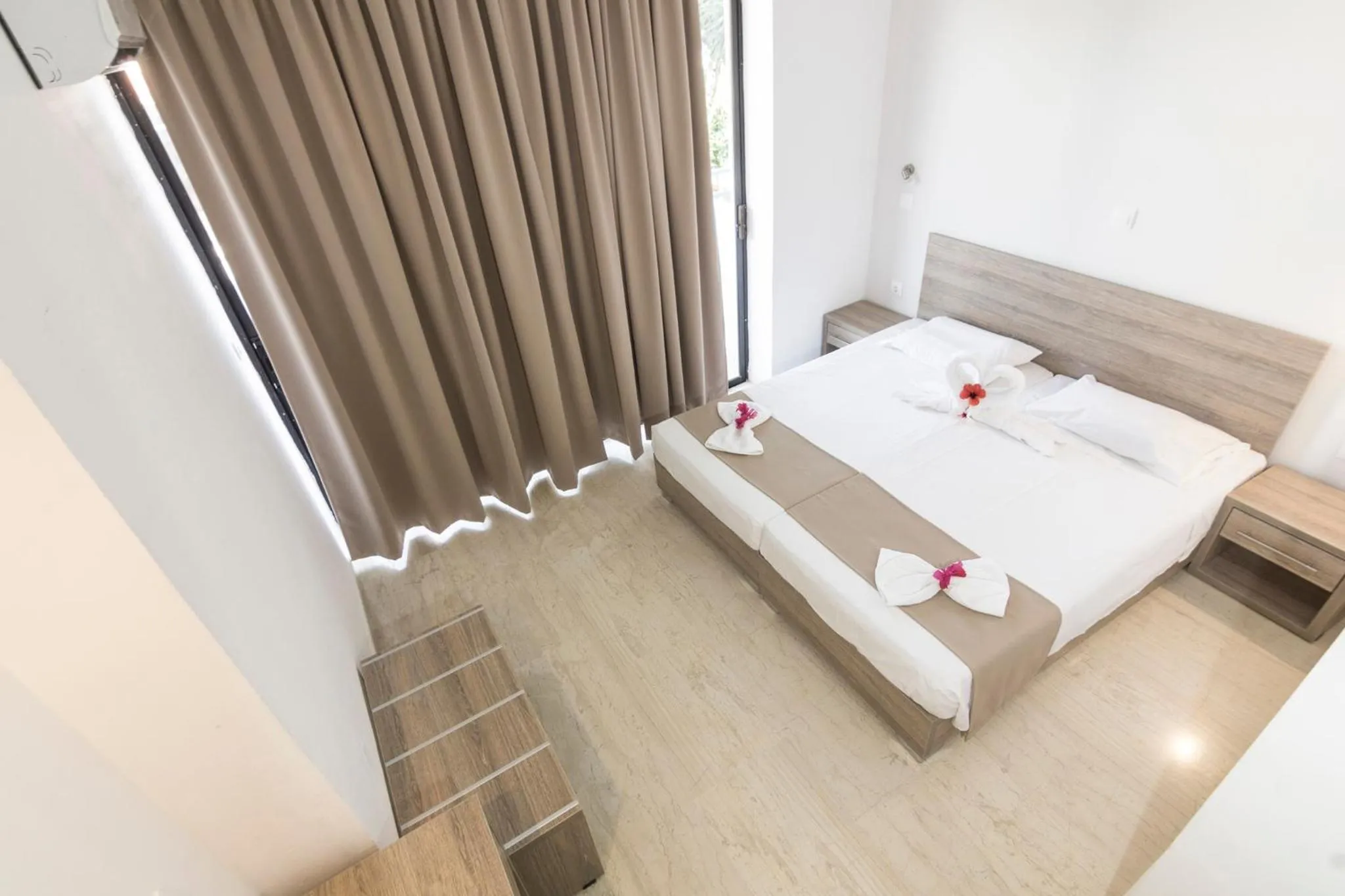 Bedroom in Tivoli Hotel