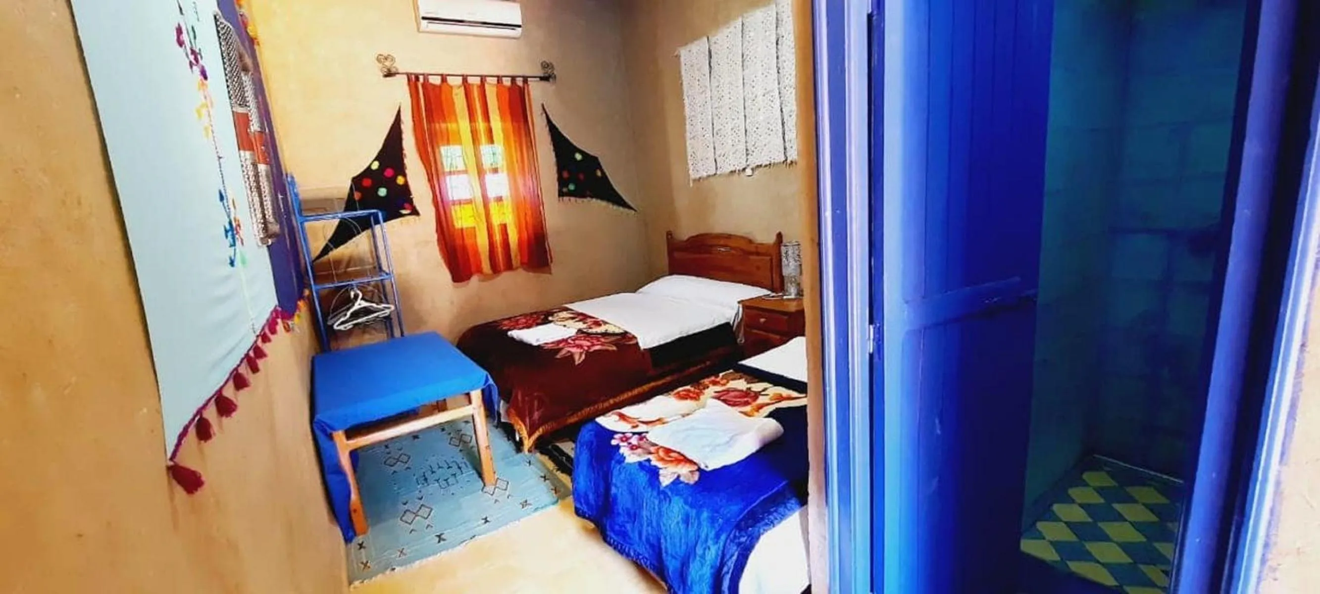 Bed in Hôtel Riad Tadarte Familier