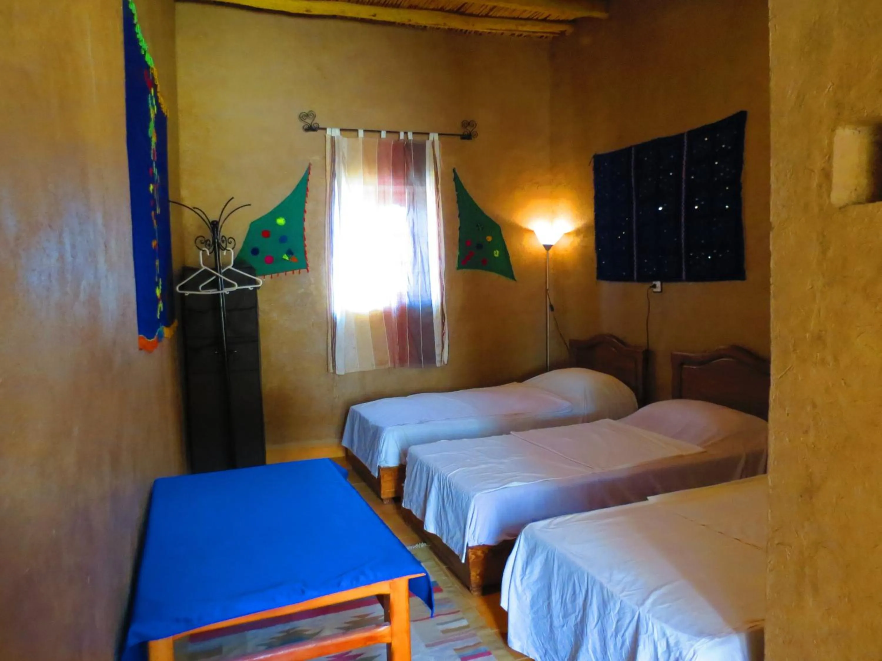 Bed in Hôtel Riad Tadarte Familier