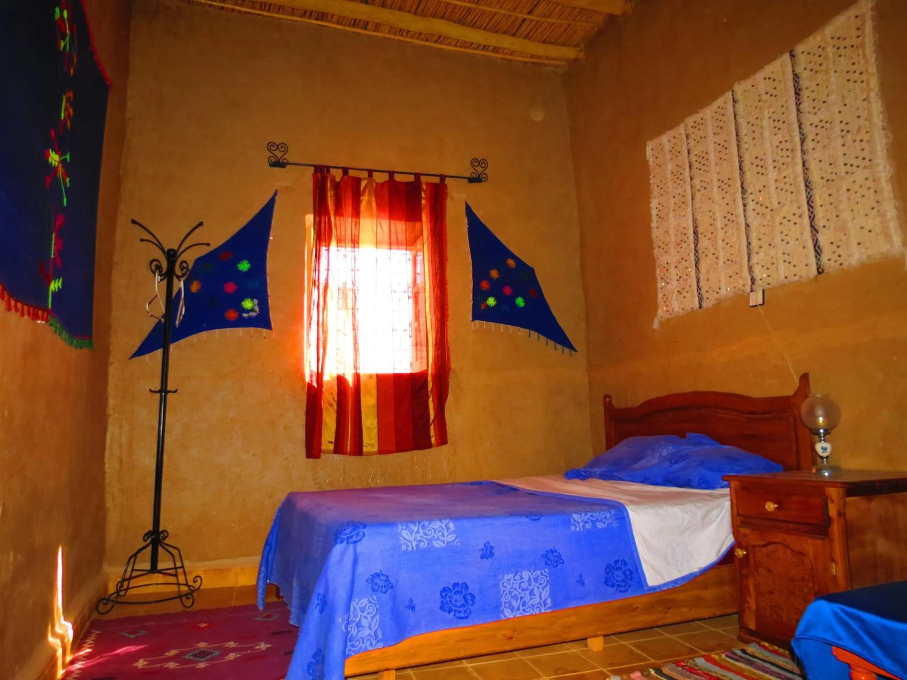 Bed in Hôtel Riad Tadarte Familier